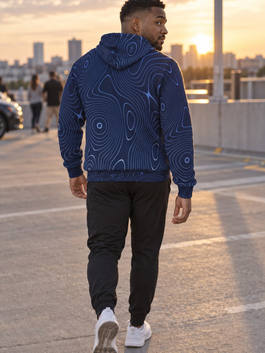 Man wearing the Cobalt Topo Men's Pullover Hoodie