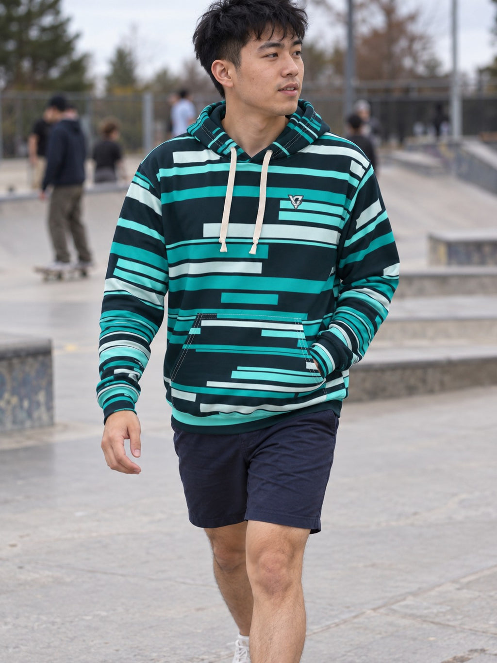 Man wearing the Teal Glitch Men's Pullover Hoodie