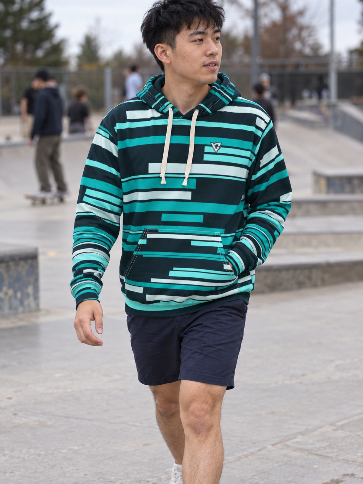 Man wearing the Teal Glitch Men's Pullover Hoodie