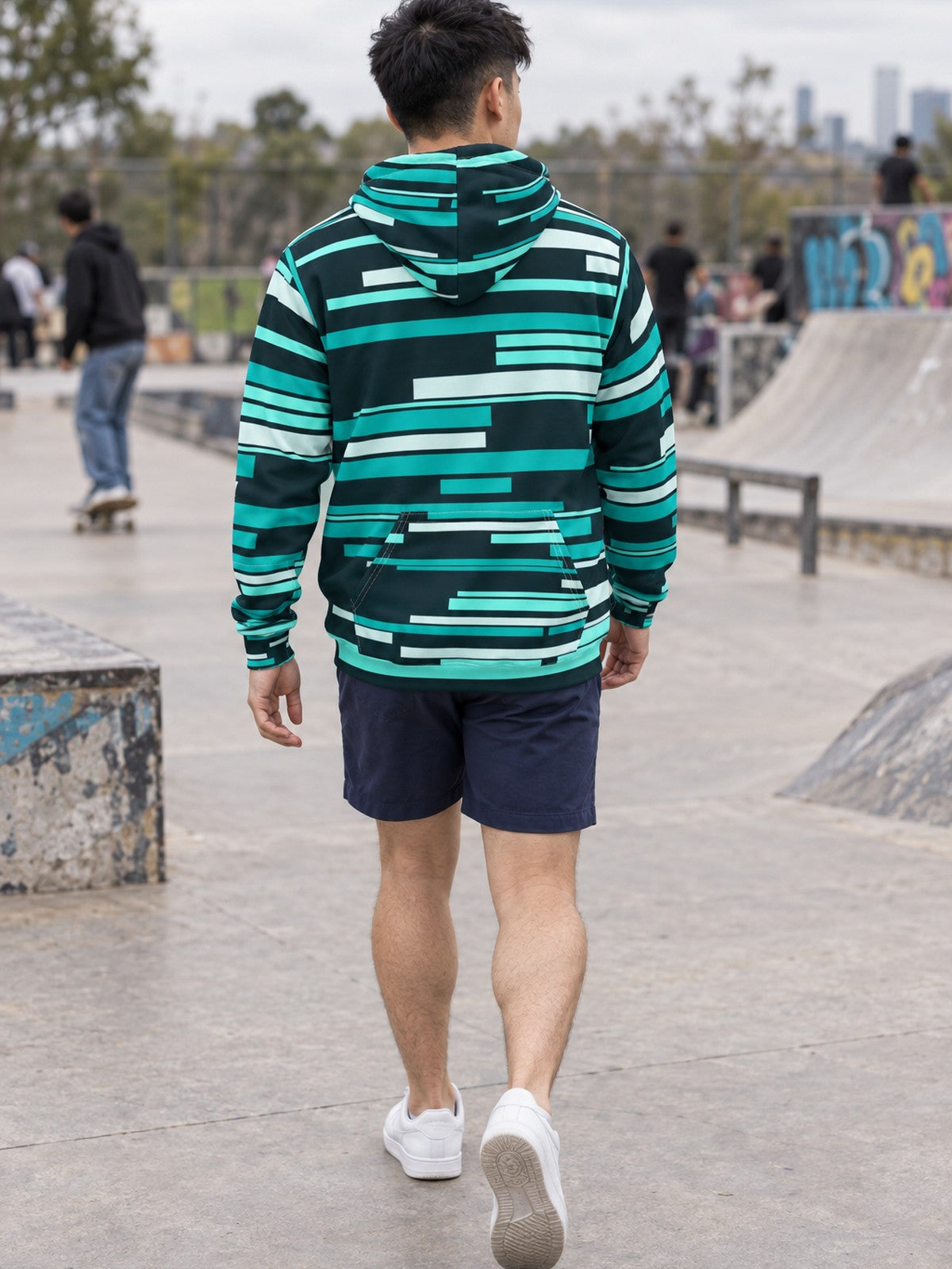 Man wearing the Teal Glitch Men's Pullover Hoodie