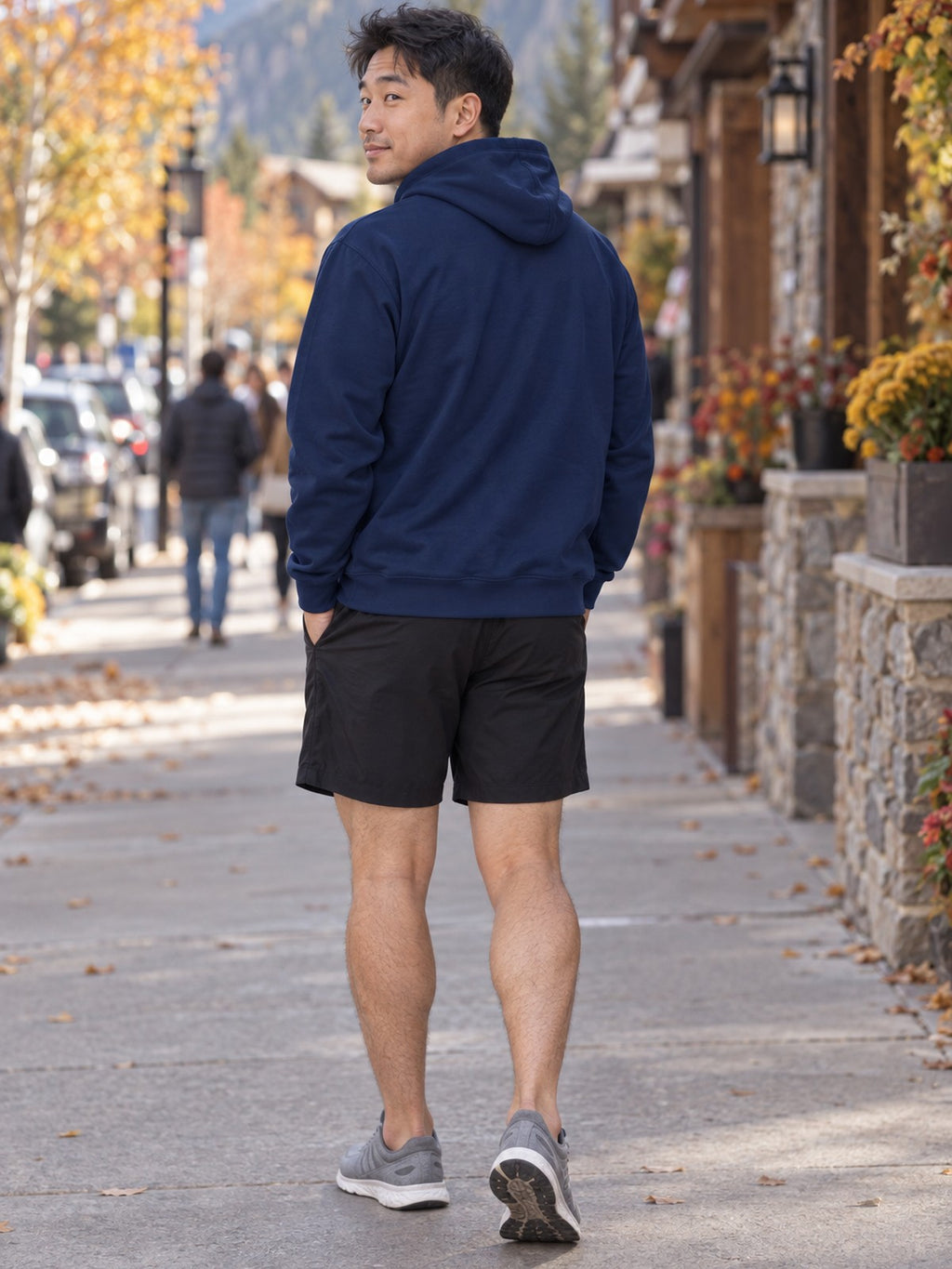 Man wearing the Midnight Navy Essential Men's Pullover Hoodie