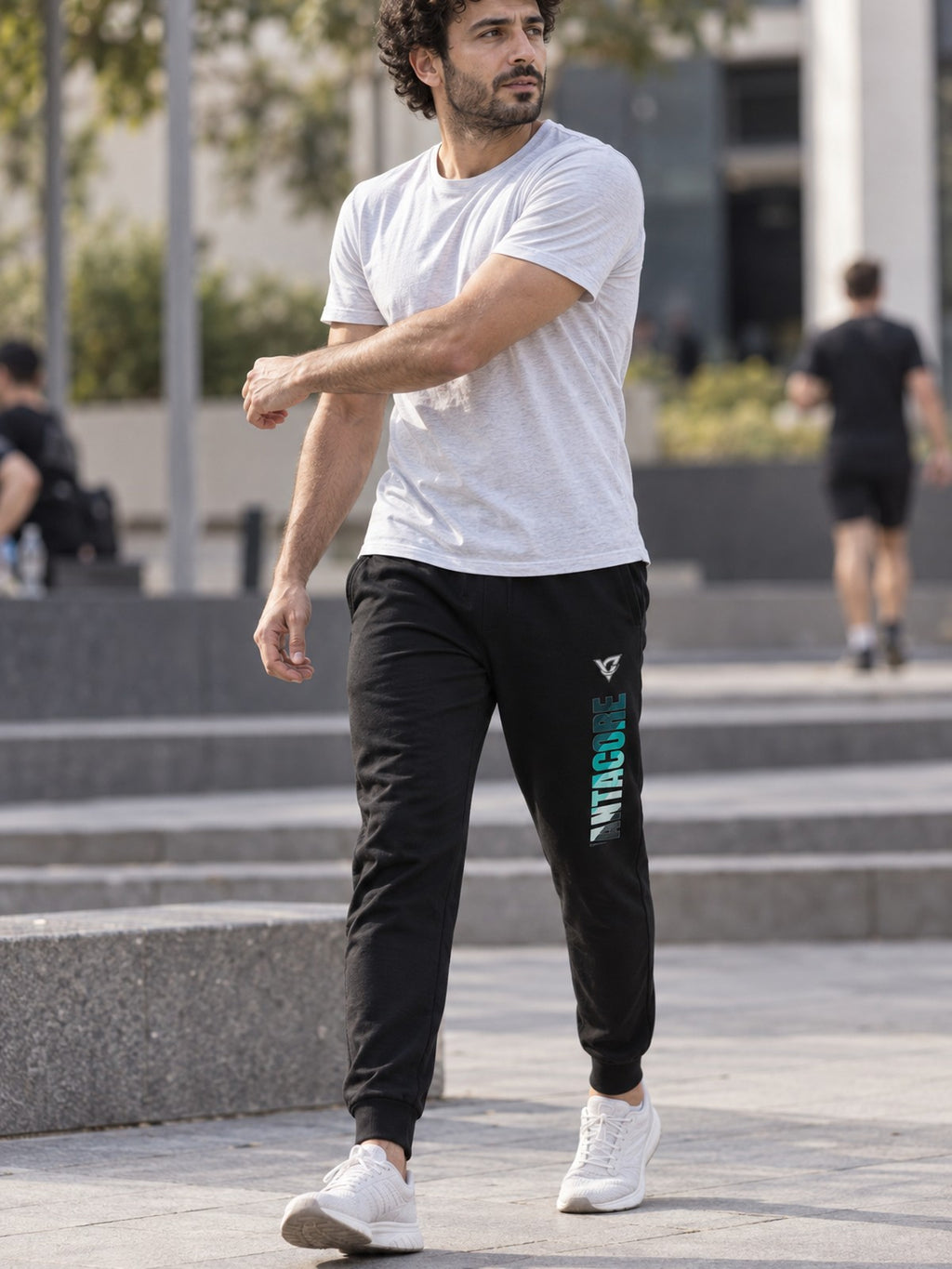Man wearing the Teal Stripe Men's Joggers