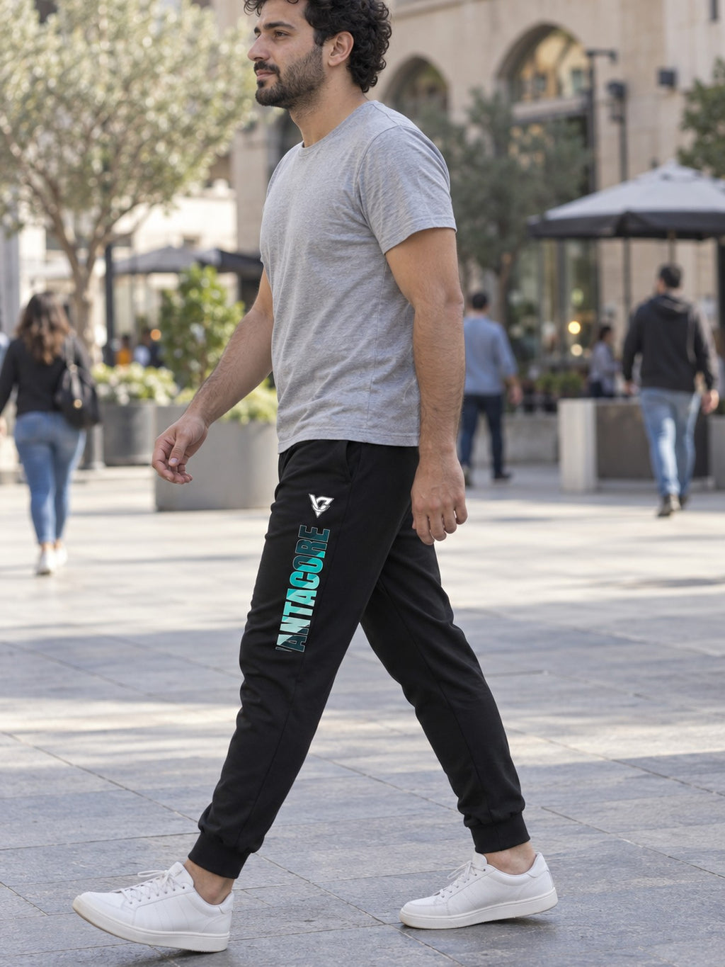 Man wearing the Teal Stripe Men's Joggers