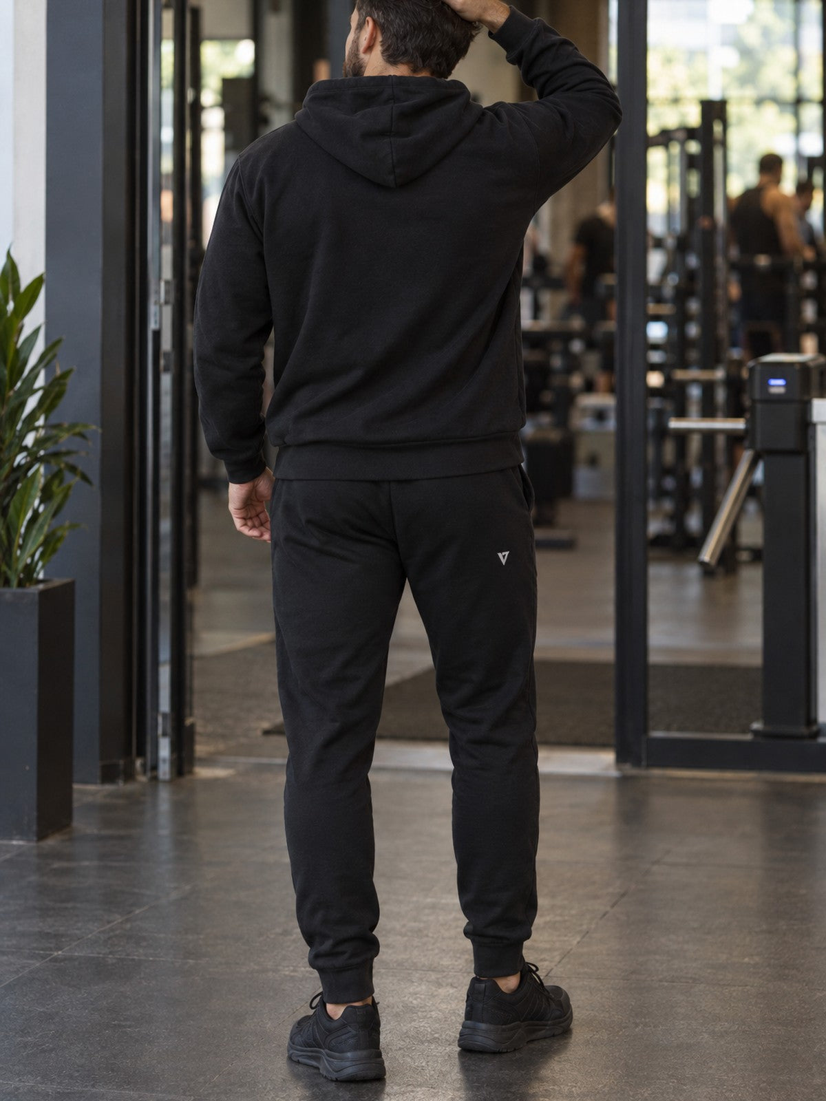 Man wearing the Signature V Men's Joggers