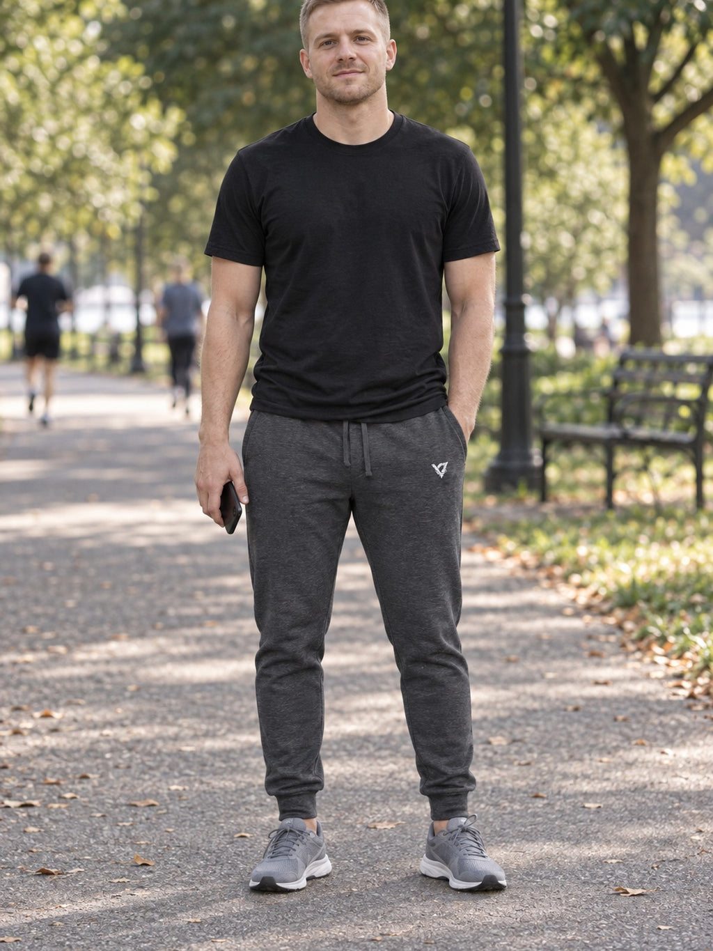 Man wearing the V Hip Logo Men's Joggers