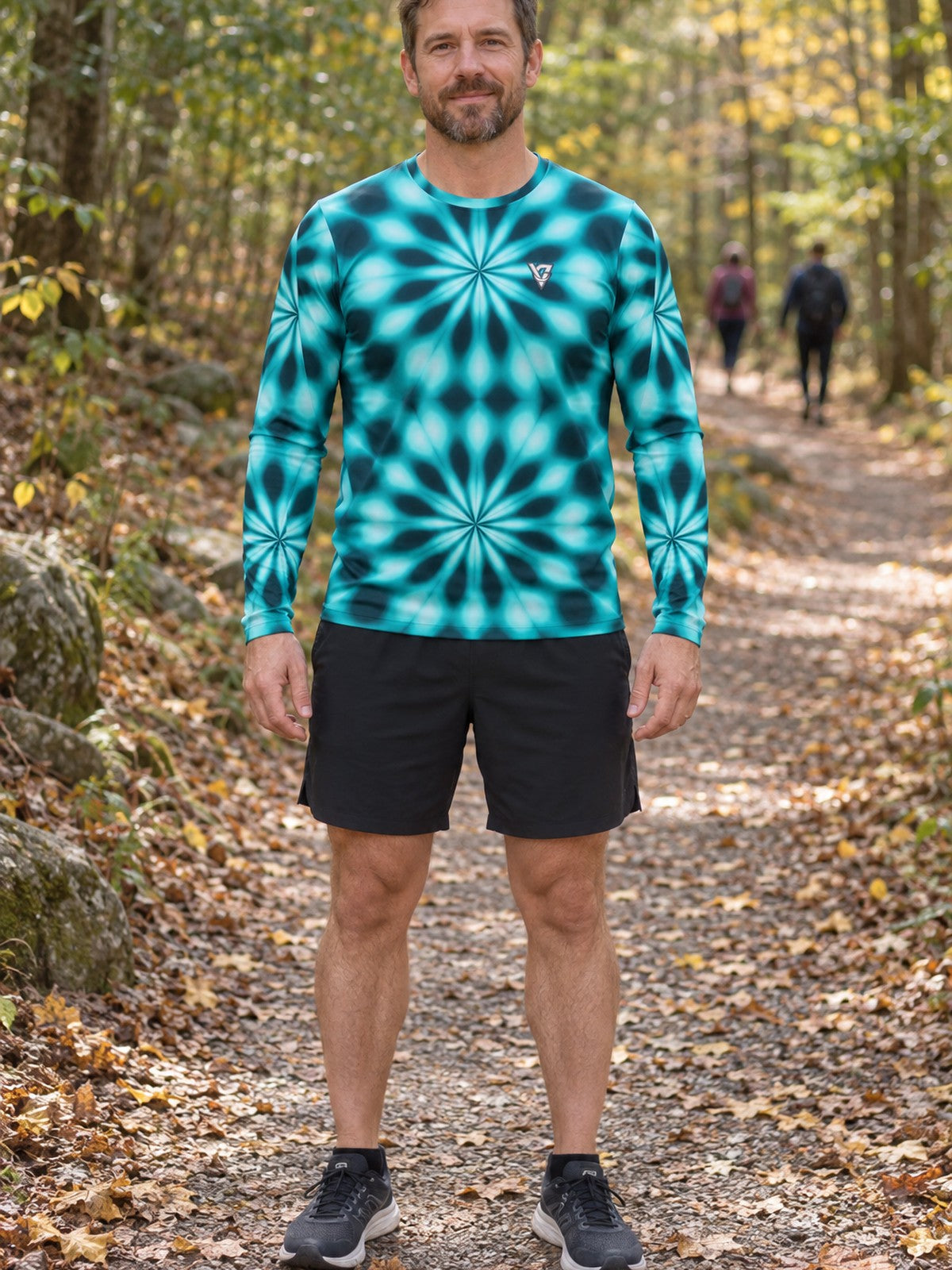 Man wearing the Teal Kaleidoscope Men's Long Sleeve Athletic Shirt