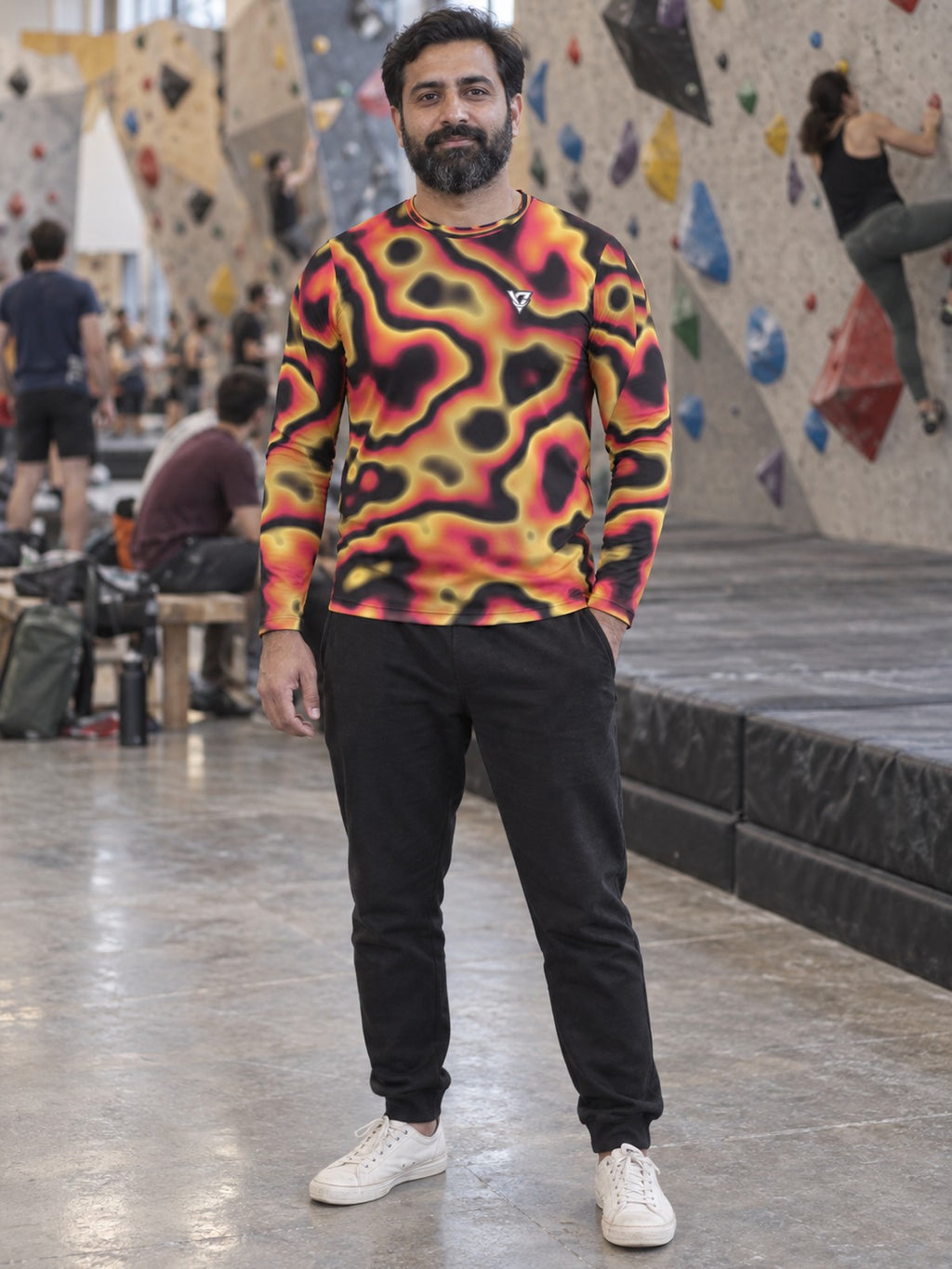 Man wearing the Inferno Oil Slick Men's Long Sleeve Athletic Shirt