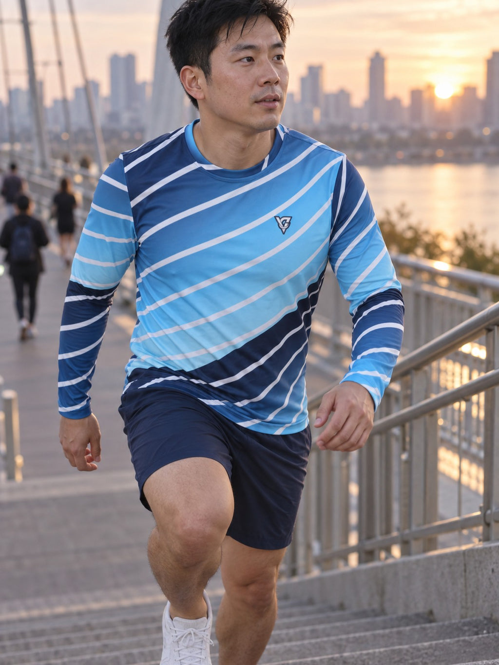 Man wearing the Arctic Ripple Men's Long Sleeve Athletic Shirt