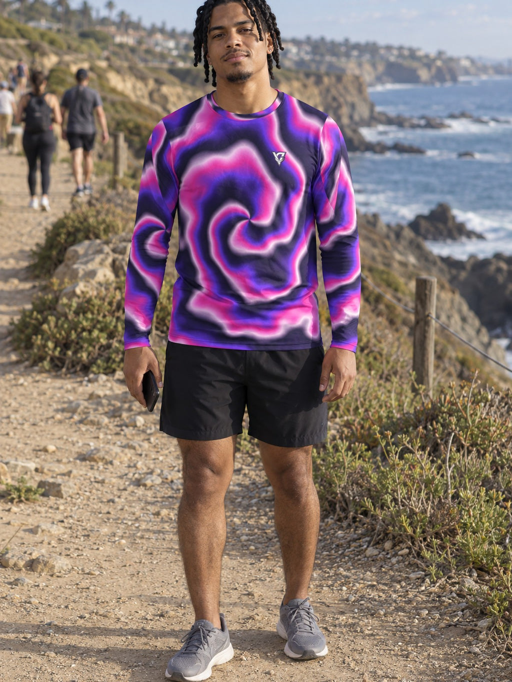 Man wearing the Royal Tie-Dye Men's Long Sleeve Athletic Shirt