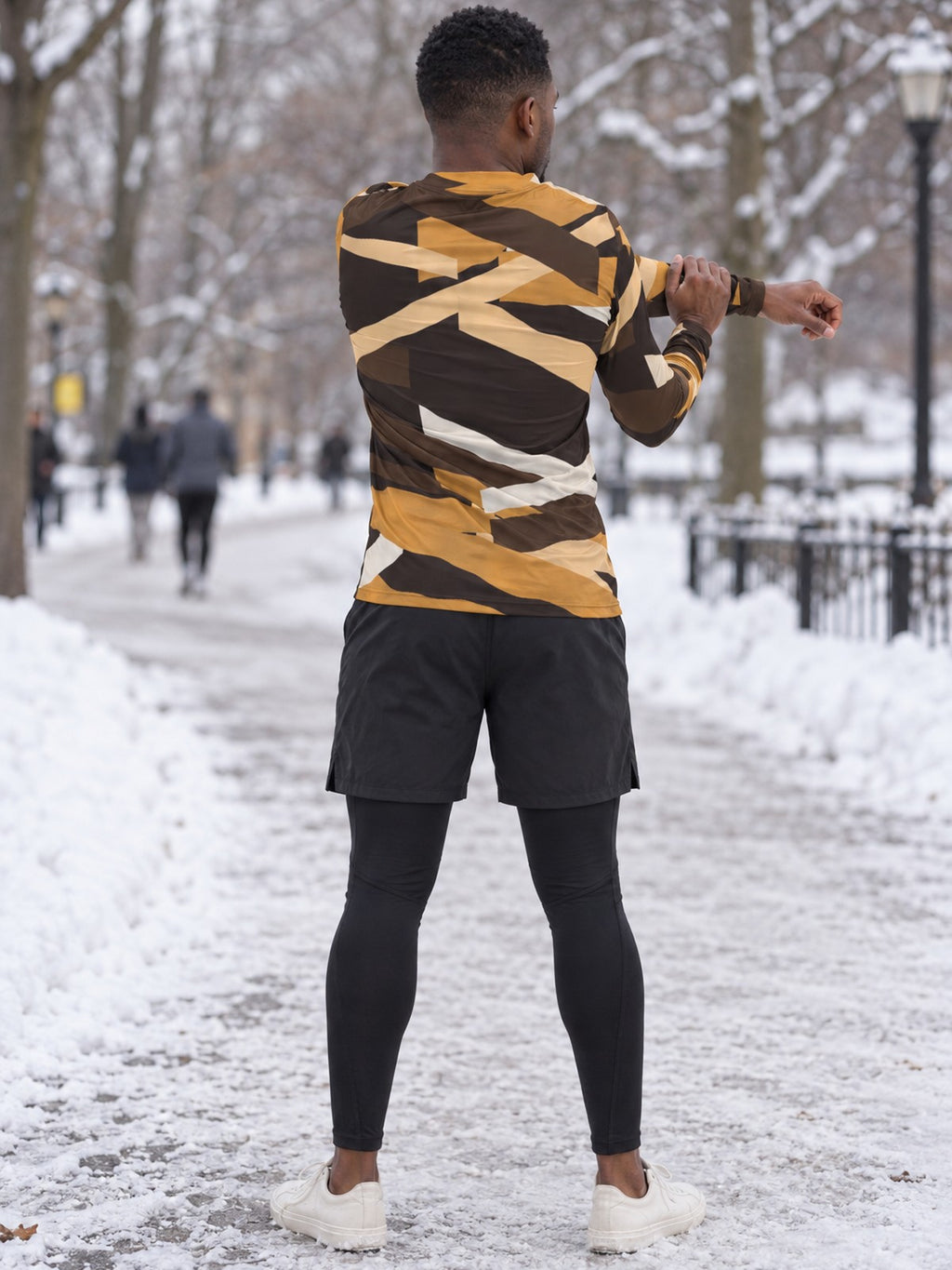 Man wearing the Desert Brushstroke Men's Long Sleeve Athletic Shirt