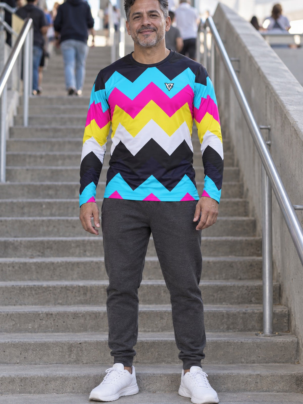 Man wearing the Neon Chevron Men's Long Sleeve Athletic Shirt
