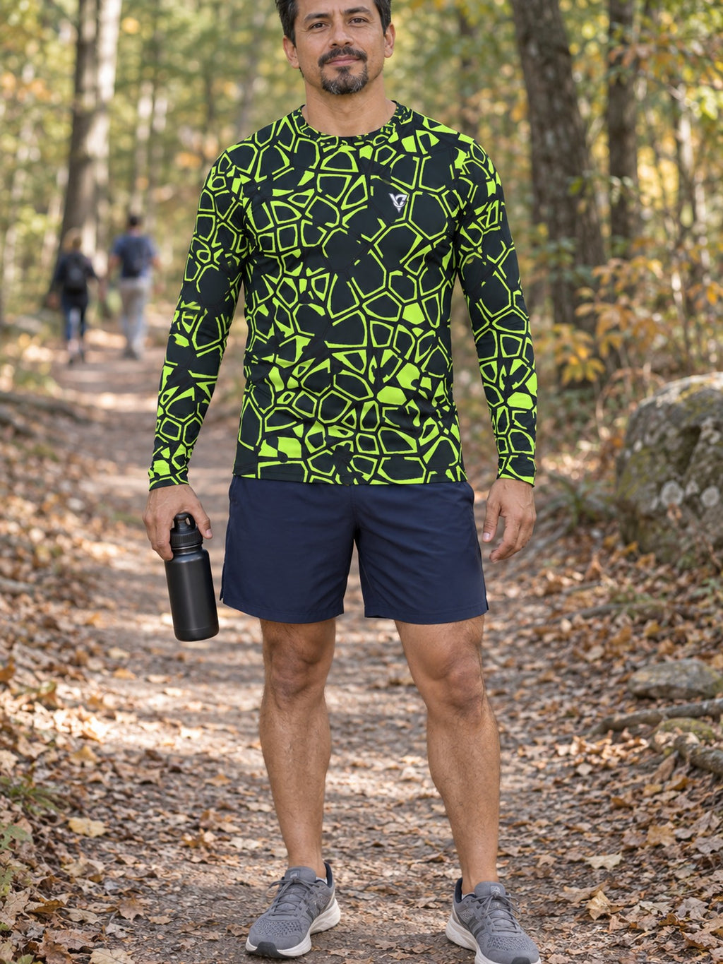 Man wearing the Volt Leopard Men's Long Sleeve Athletic Shirt