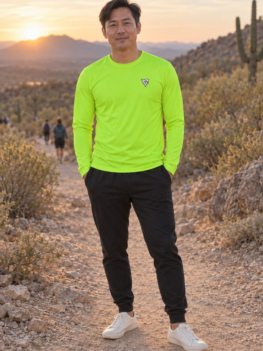 Man wearing the Volt Green Essential Men's Long Sleeve Athletic Shirt