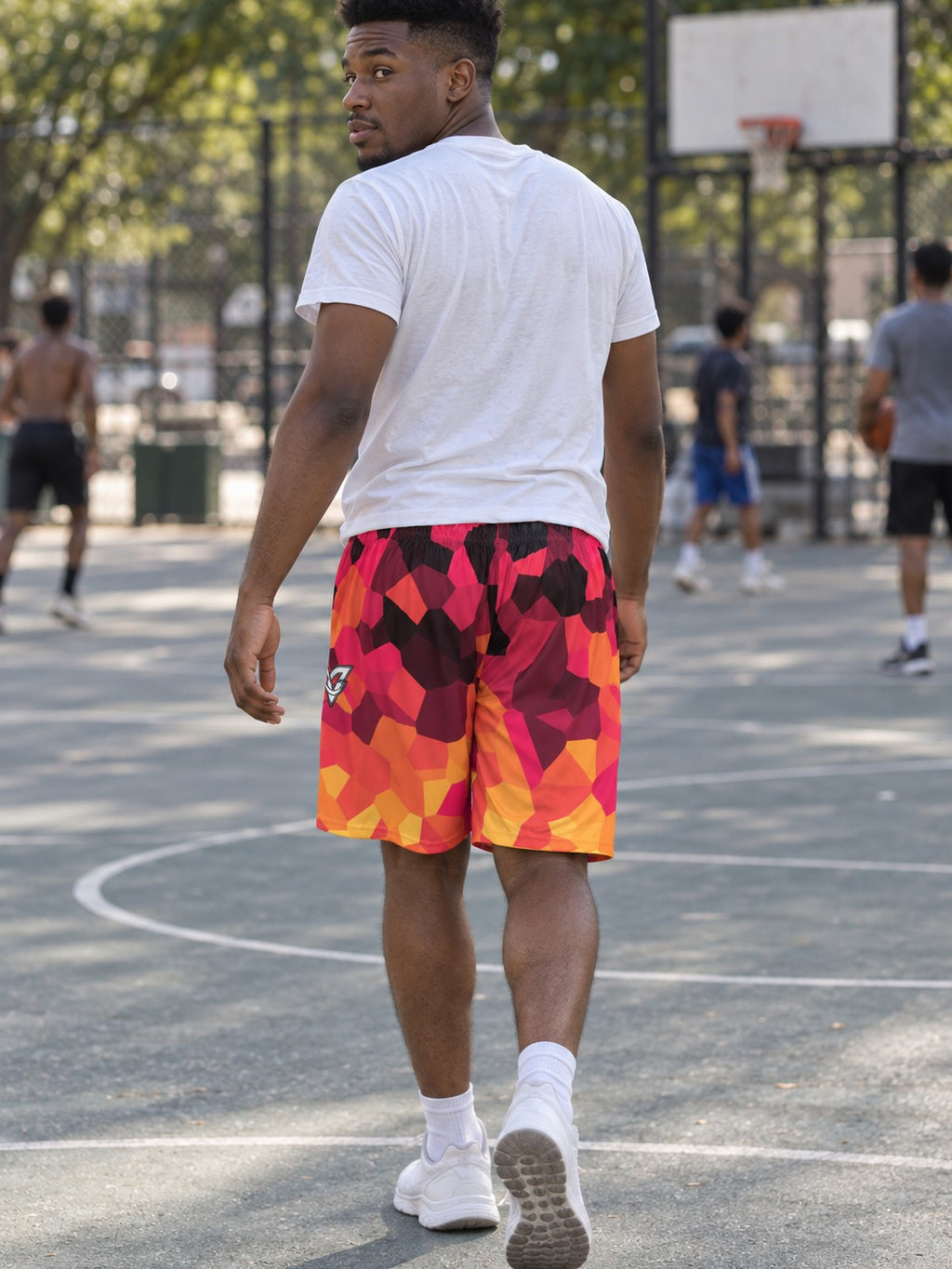 Man wearing the Men's Inferno Shard Athletic Sports Shorts