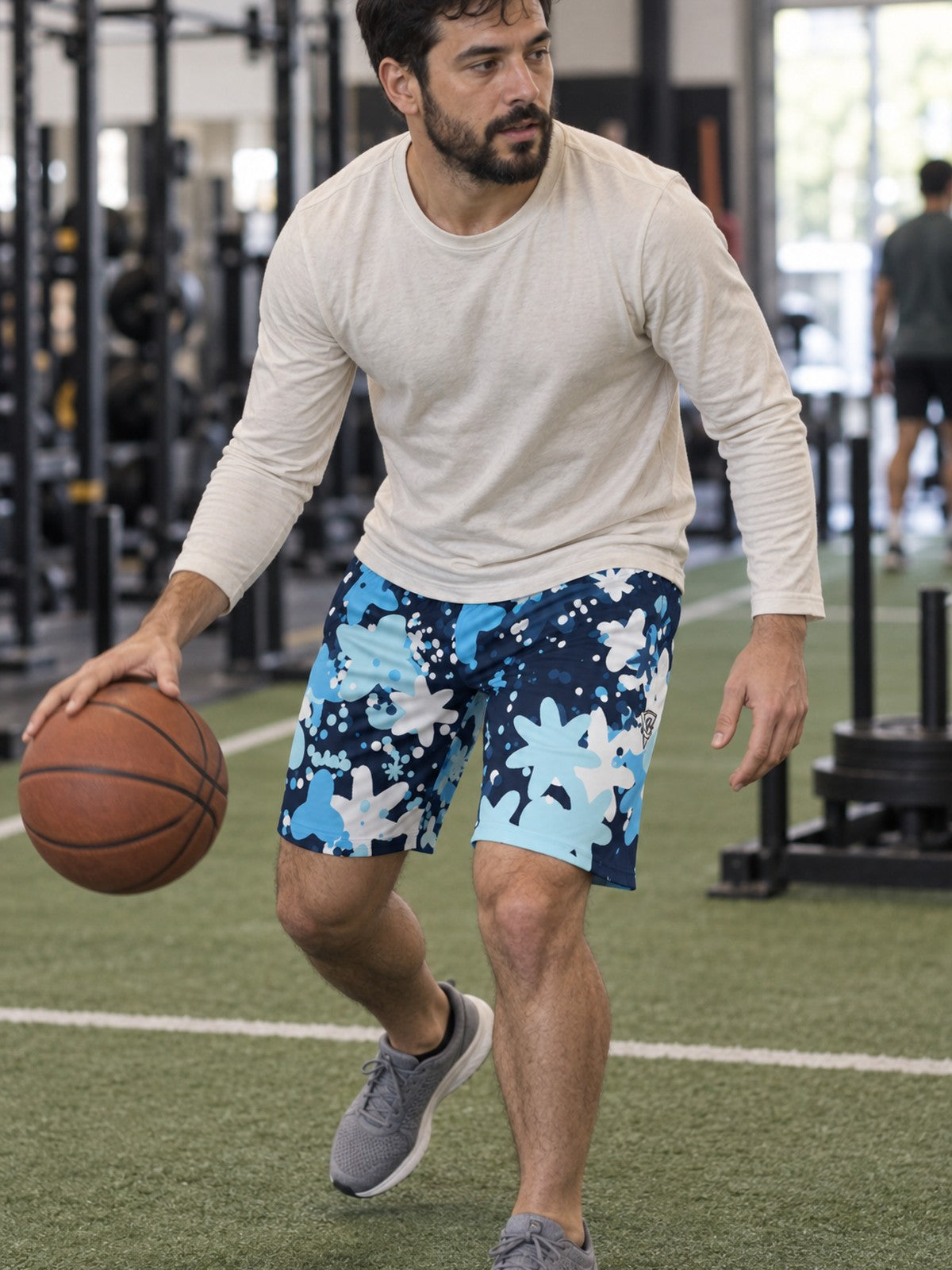 Man wearing the Men's Arctic Splatter Athletic Sports Shorts