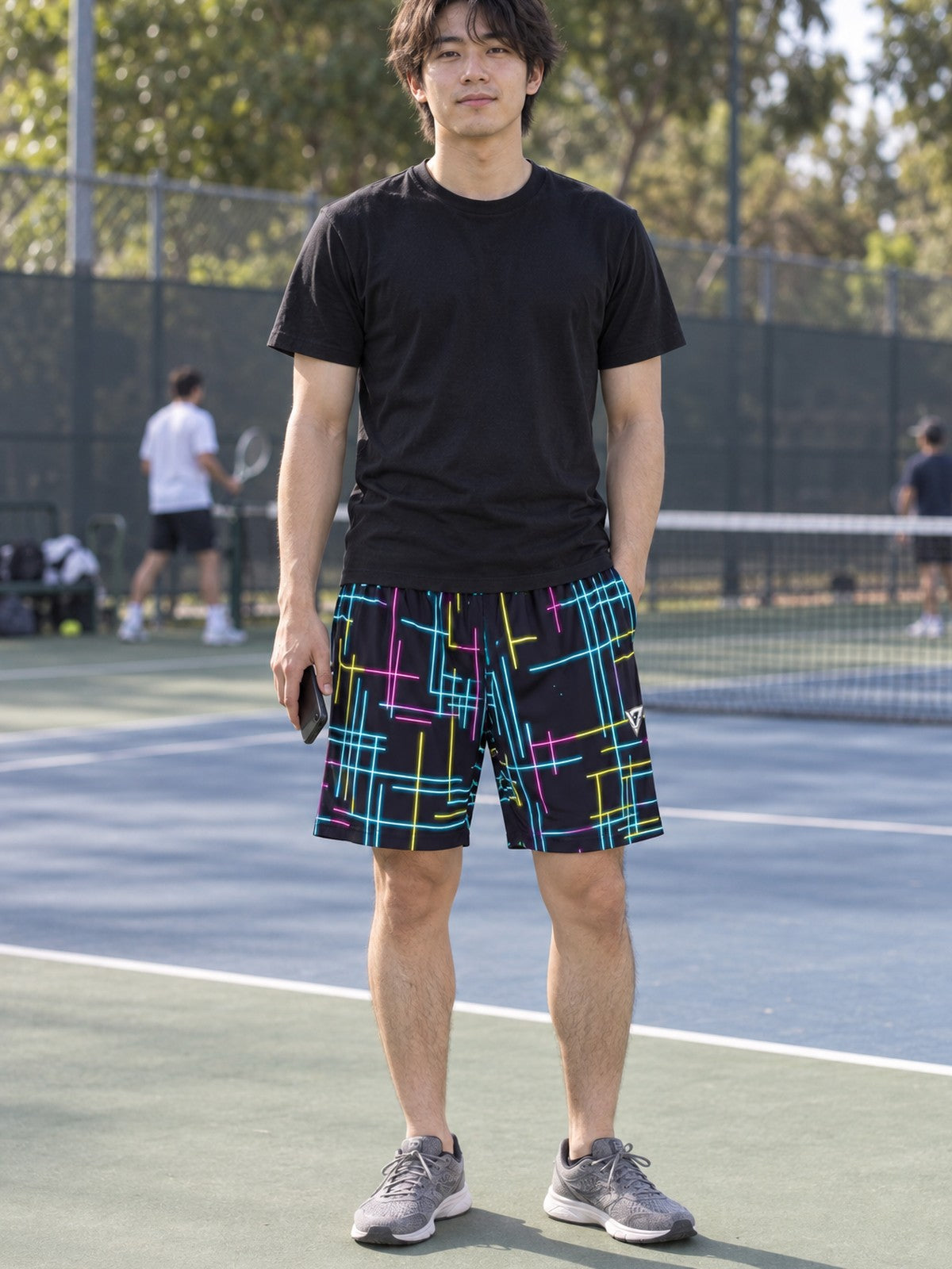 Man wearing the Men's Neon Circuit Athletic Sports Shorts
