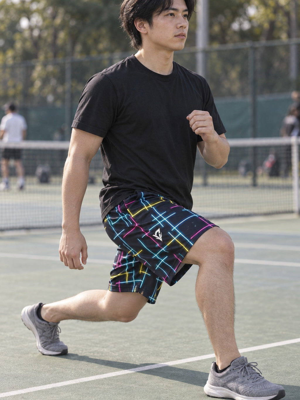 Man wearing the Men's Neon Circuit Athletic Sports Shorts