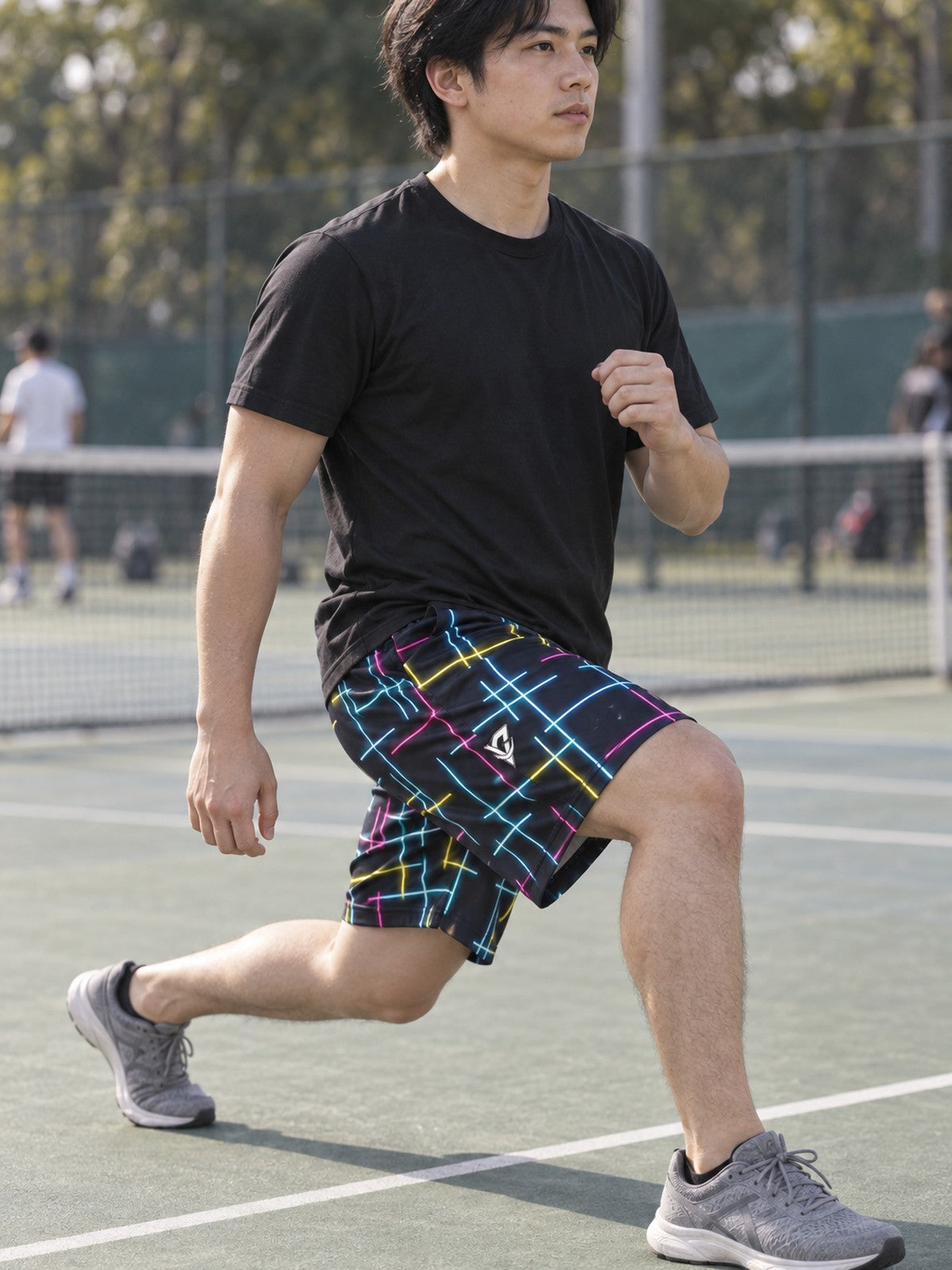 Man wearing the Men's Neon Circuit Athletic Sports Shorts