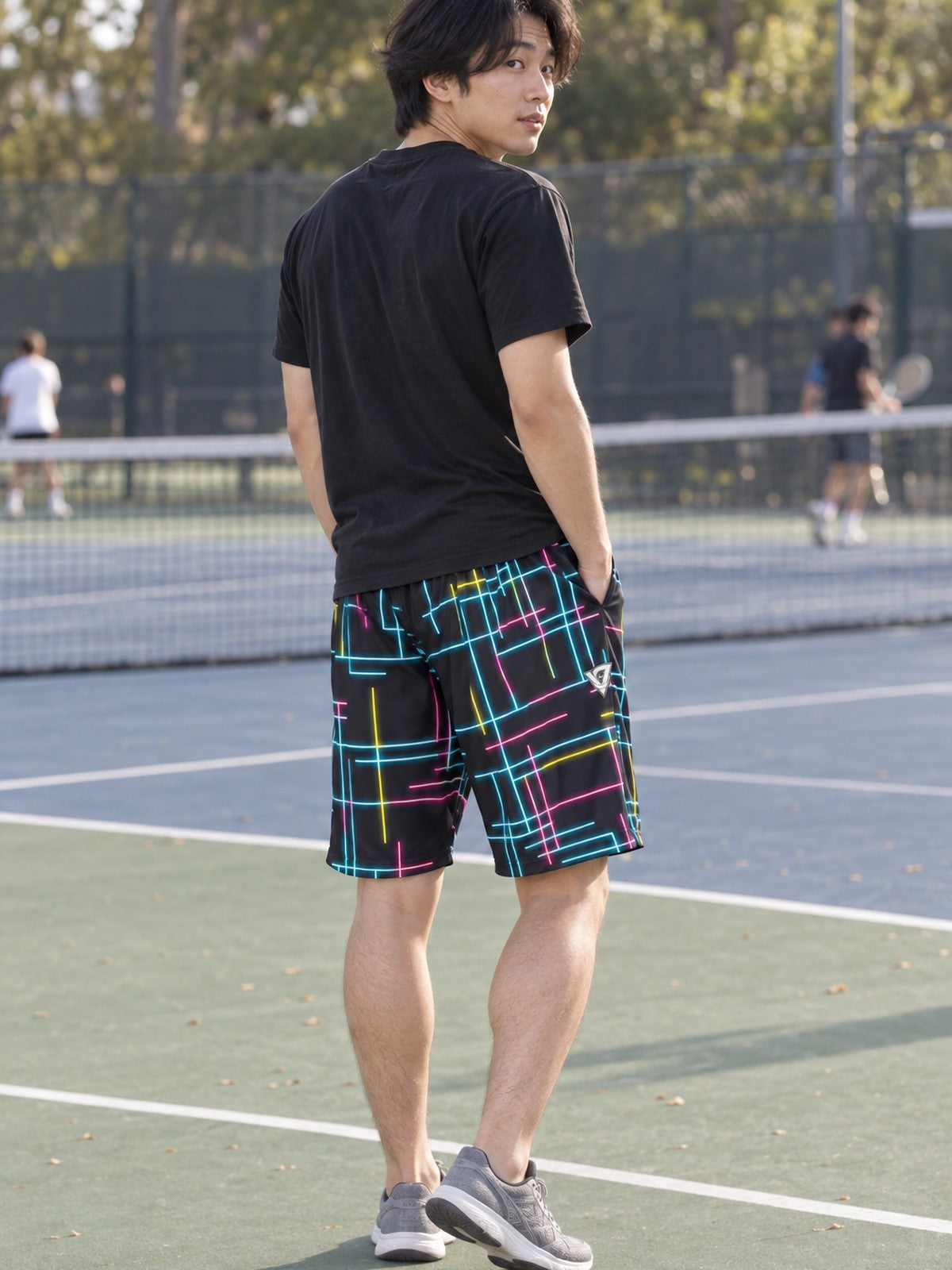 Man wearing the Men's Neon Circuit Athletic Sports Shorts