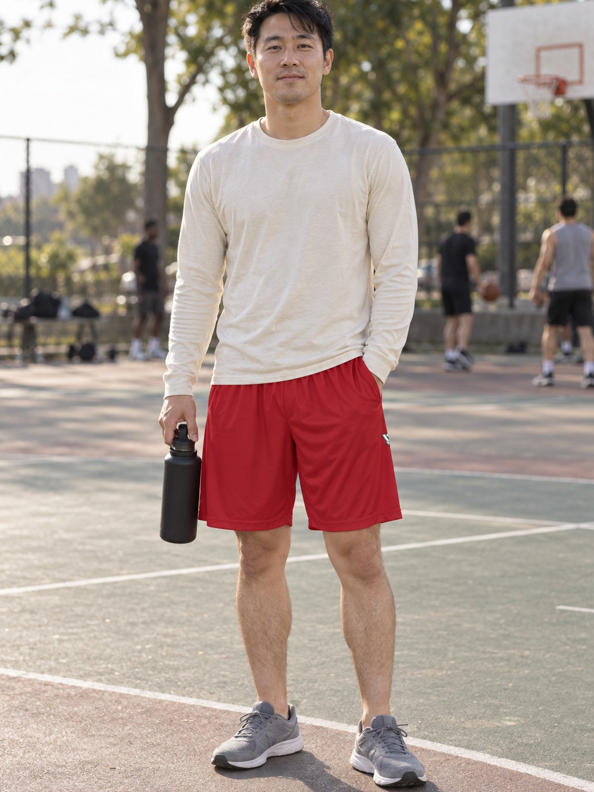 Man wearing the Men's Crimson Essential Athletic Sports Shorts