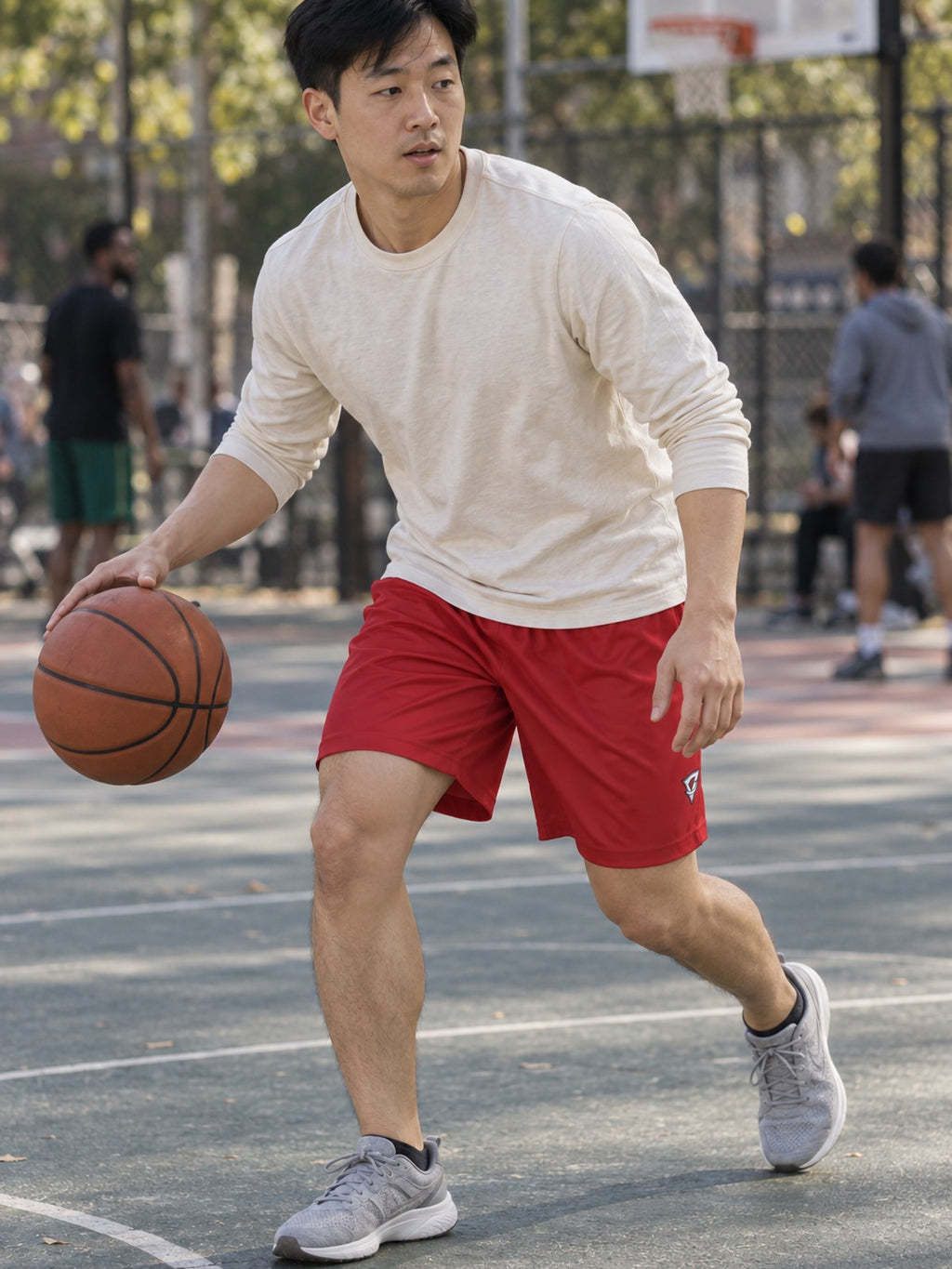 Man wearing the Men's Crimson Essential Athletic Sports Shorts
