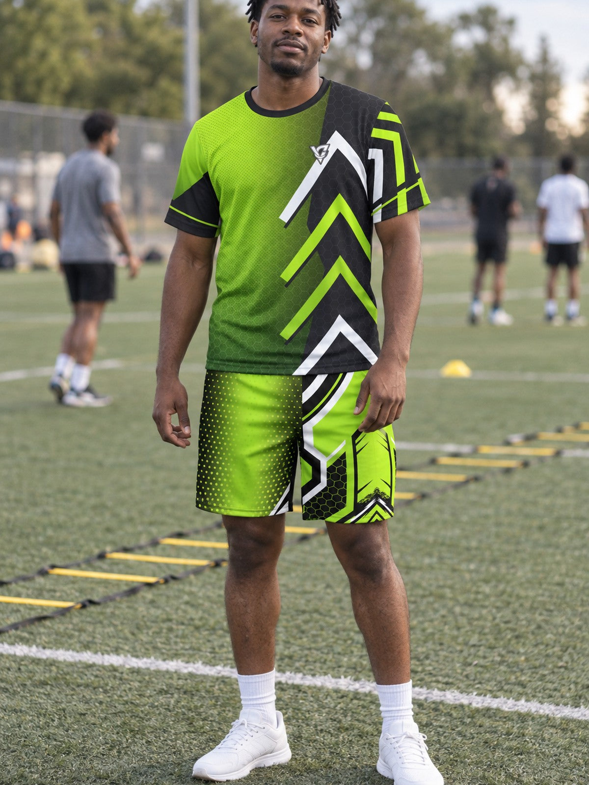 Man wearing the Volt Strike men's matching set – athletic shirt and multipurpose shorts – front view