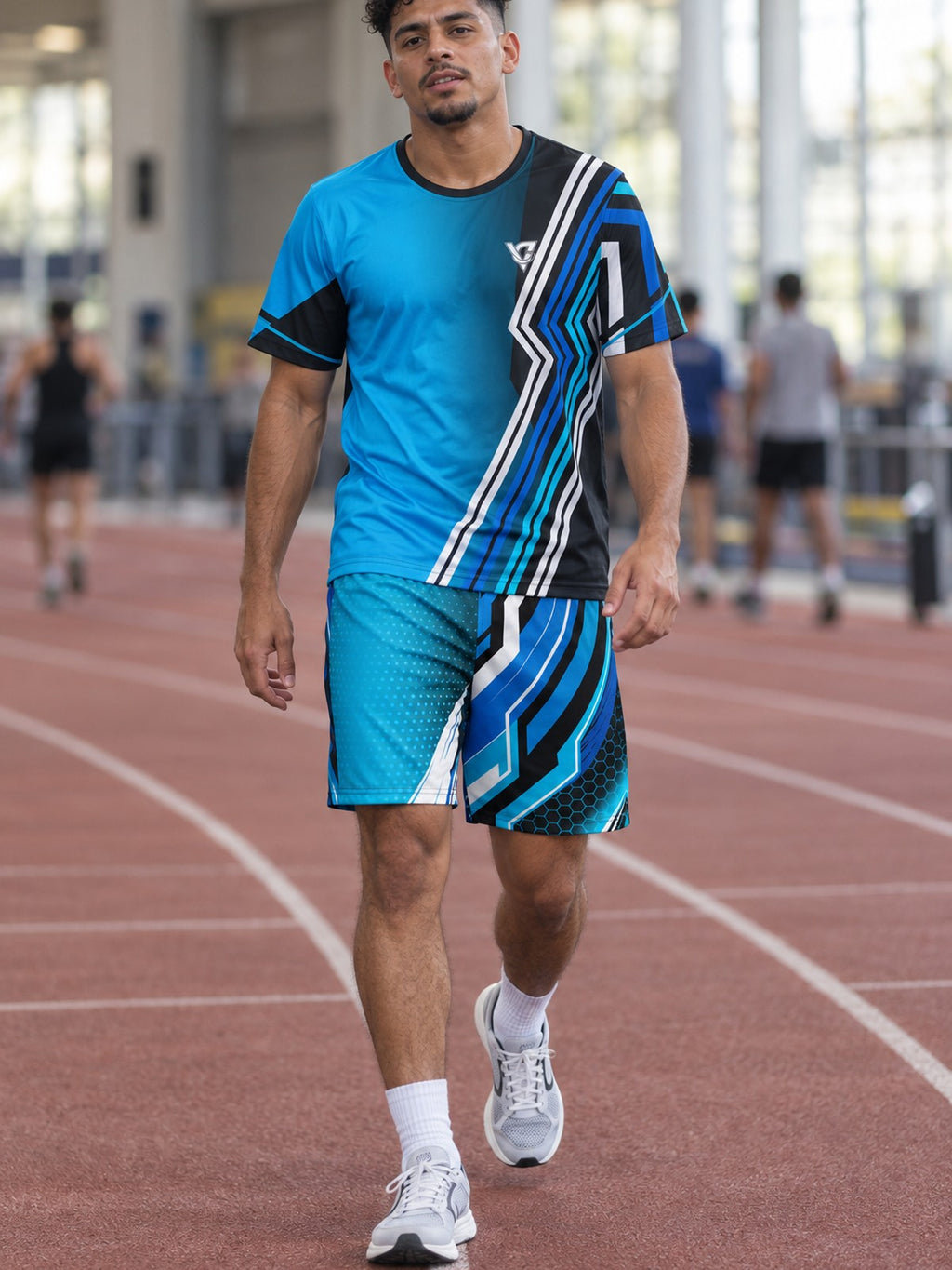 Man wearing the Electric Cyan Velocity men's matching set – athletic shirt and multipurpose shorts – front view