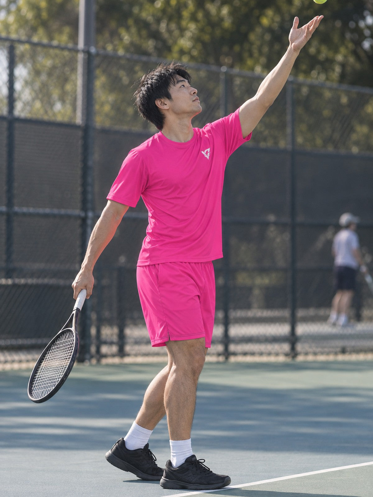 Man wearing the Electric Pink Essential men's matching set – side view