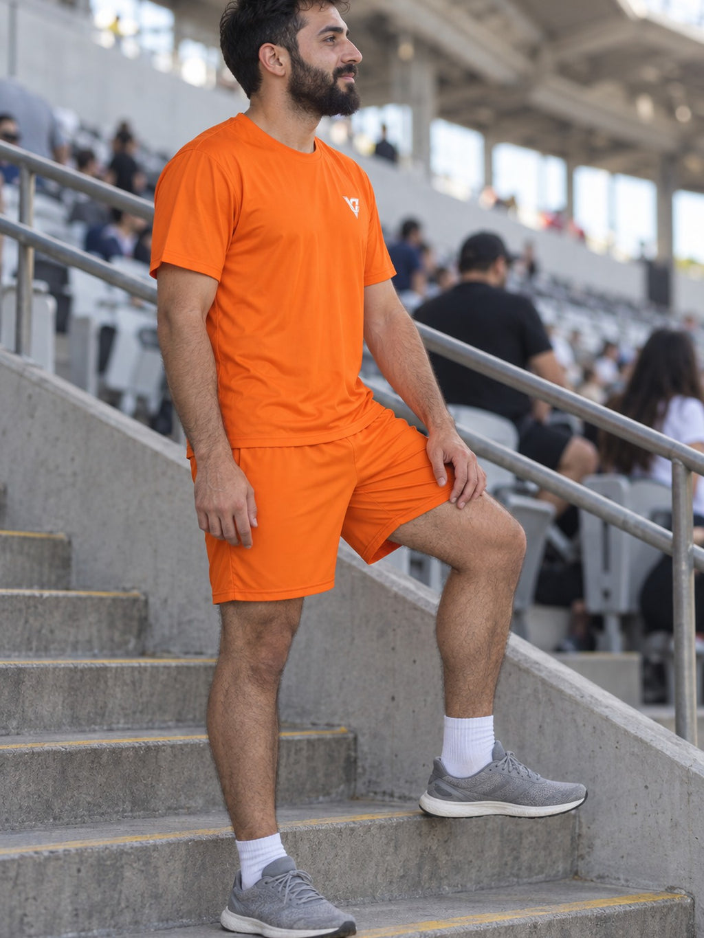 Man wearing the Blaze Orange Essential men's matching set – side view