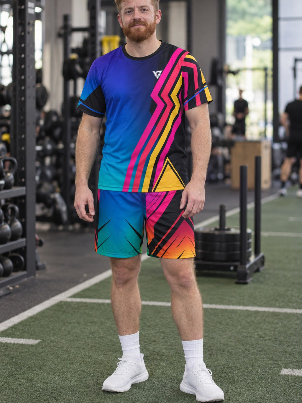 Man wearing the Spectrum Rush men's matching set – athletic shirt and multipurpose shorts – front view
