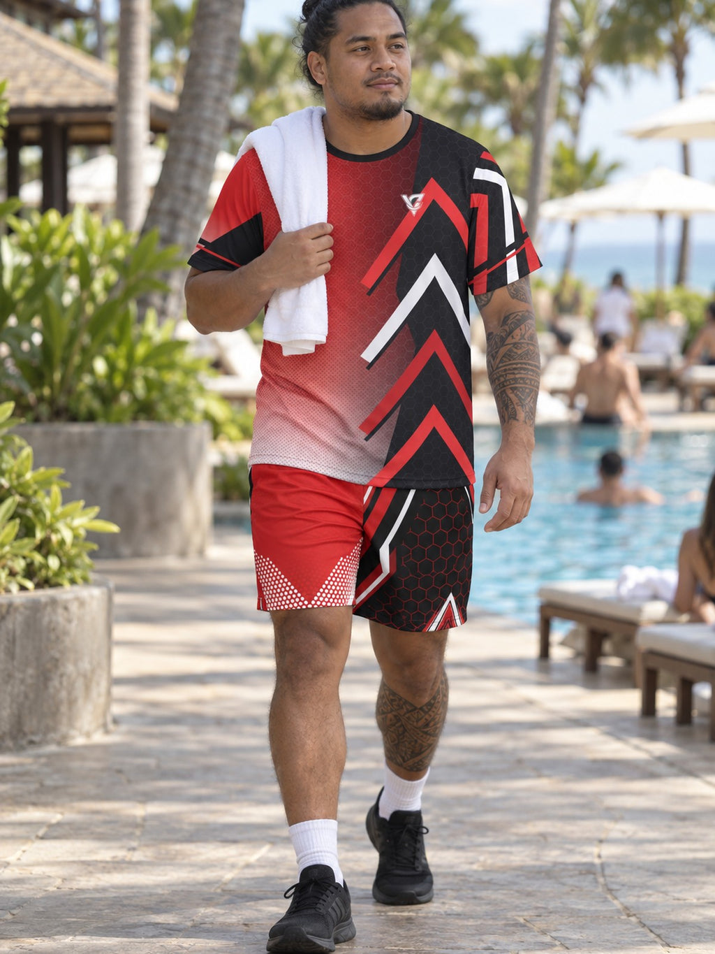 Man wearing the Crimson Hex Elite men's matching set – athletic shirt and multipurpose shorts – front view