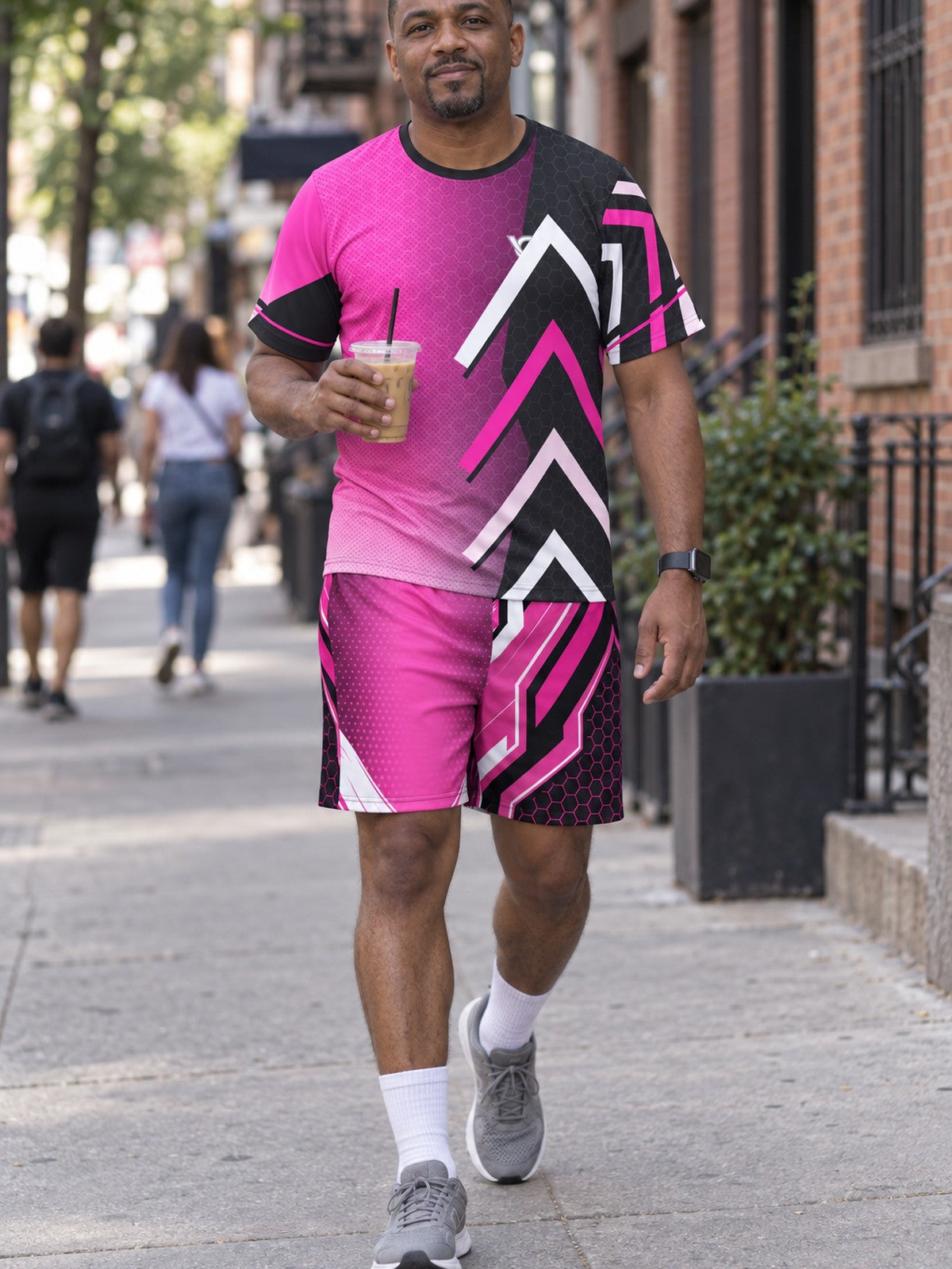 Man wearing the Neon Fusion Hex men's matching set – athletic shirt and multipurpose shorts – front view