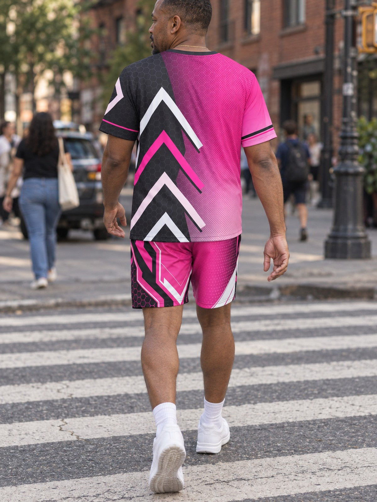 Man wearing the Neon Fusion Hex men's matching set – back view