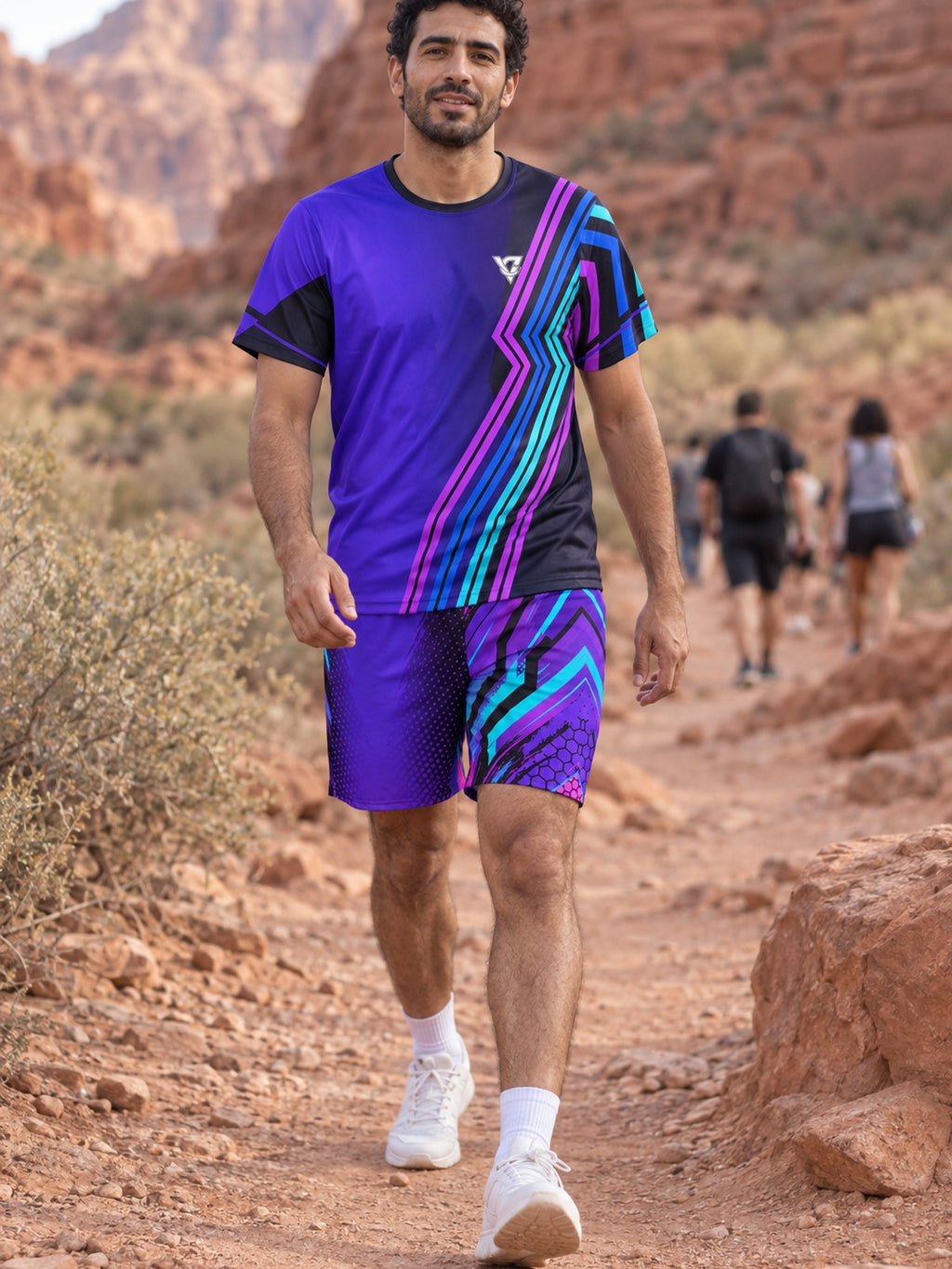 Man wearing the Electric Vortex men's matching set – athletic shirt and multipurpose shorts – front view
