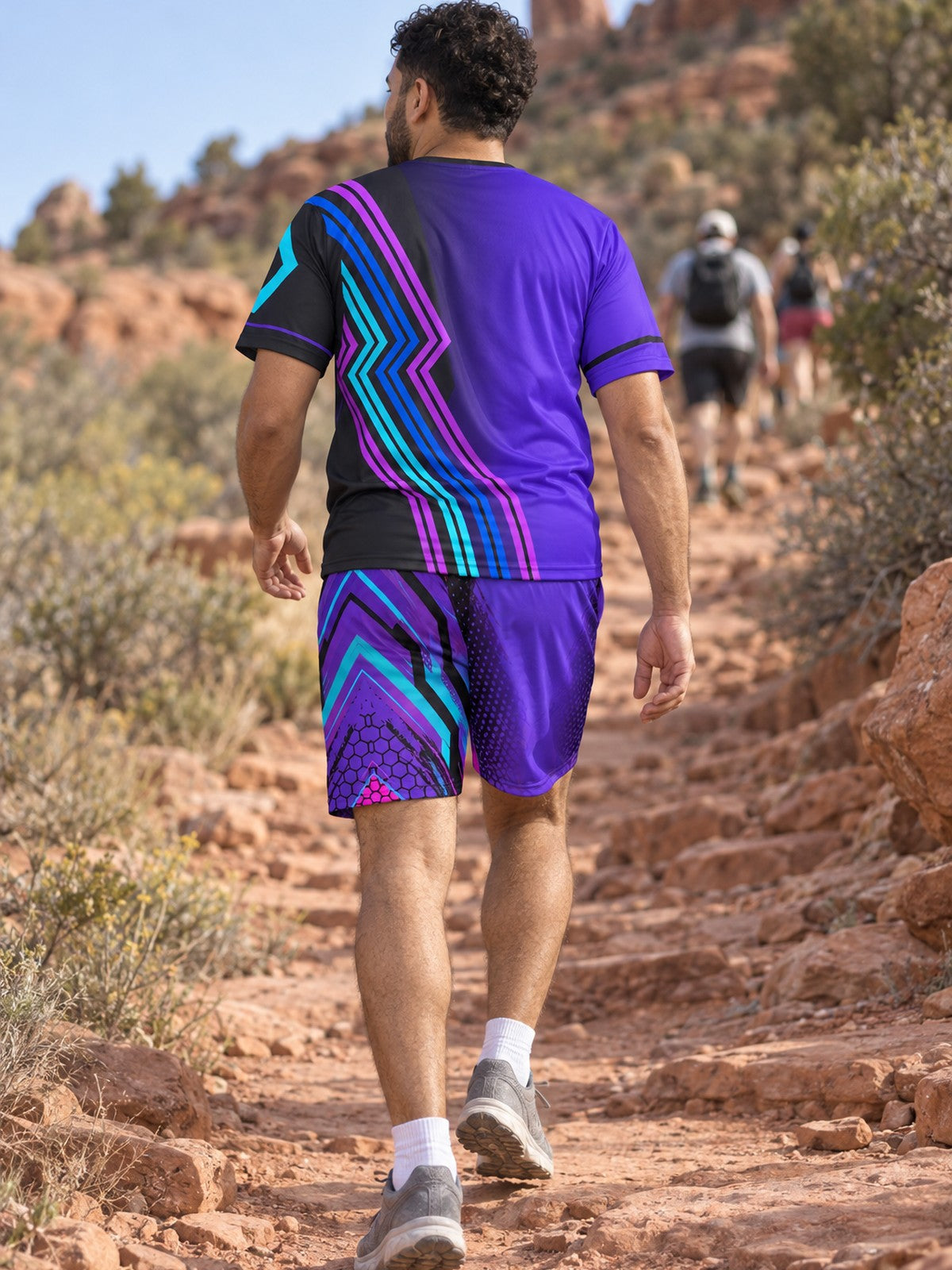 Man wearing the Electric Vortex men's matching set – back view