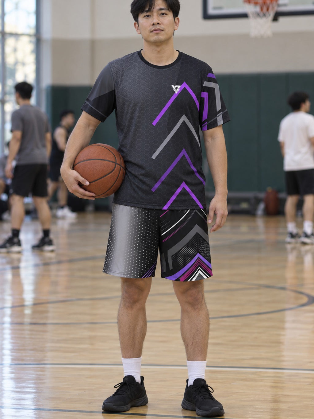 Man wearing the Phantom Pulse men's matching set – athletic shirt and multipurpose shorts – front view