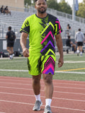 Man wearing the Volt Fusion men's matching set – athletic shirt and multipurpose shorts – front view