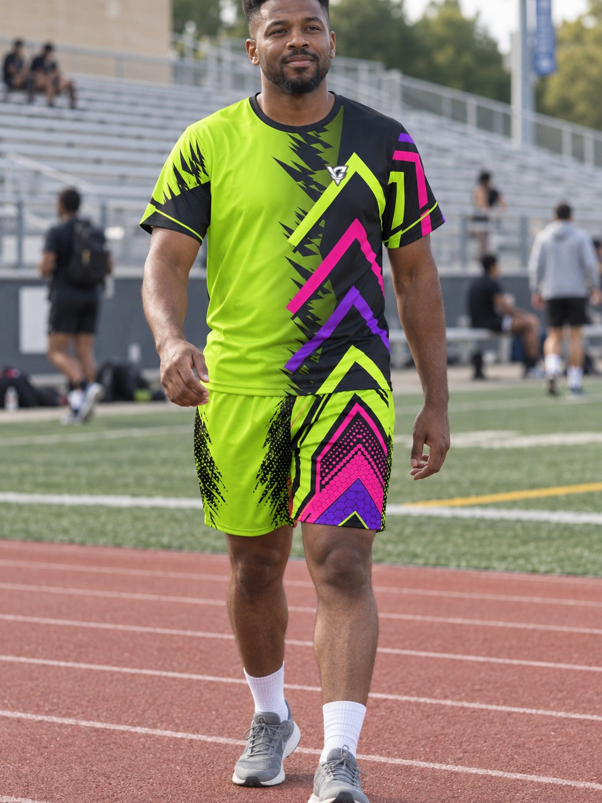 Man wearing the Volt Fusion men's matching set – athletic shirt and multipurpose shorts – front view