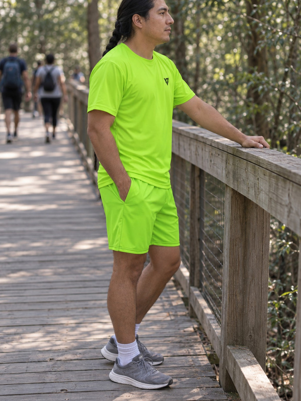 Man wearing the Volt Green Essential men's matching set – side view