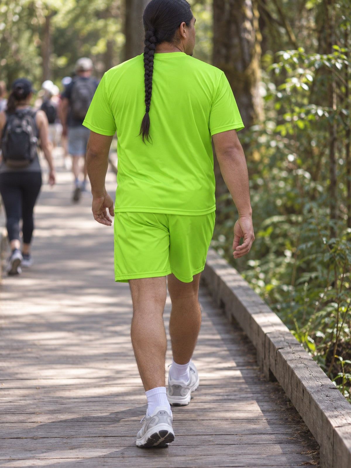 Man wearing the Volt Green Essential men's matching set – back view