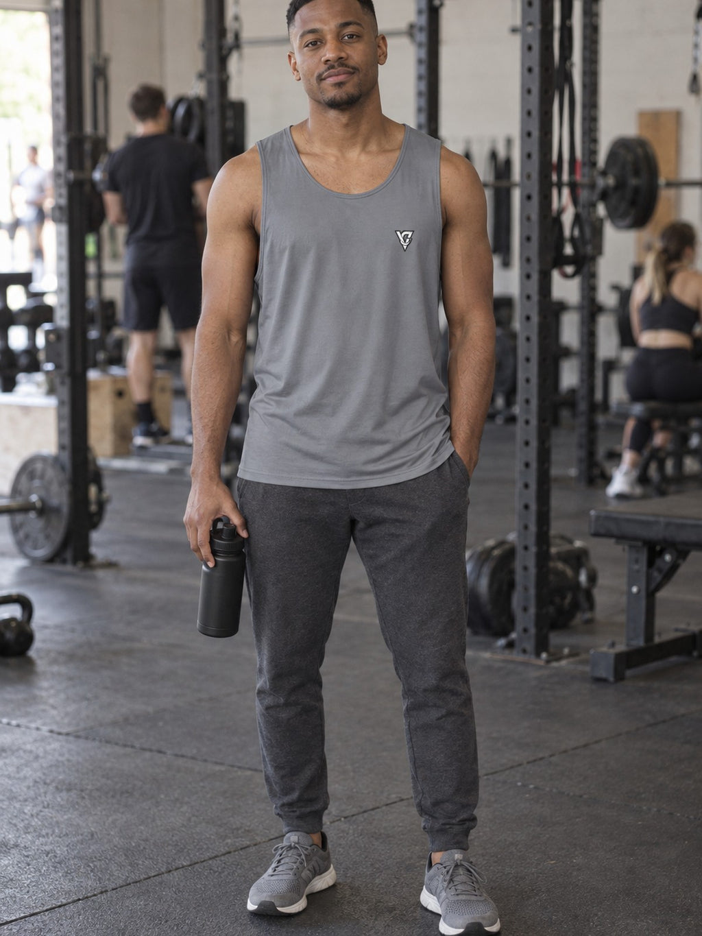 Man wearing the Stone Grey Essential Men's Athletic Tank