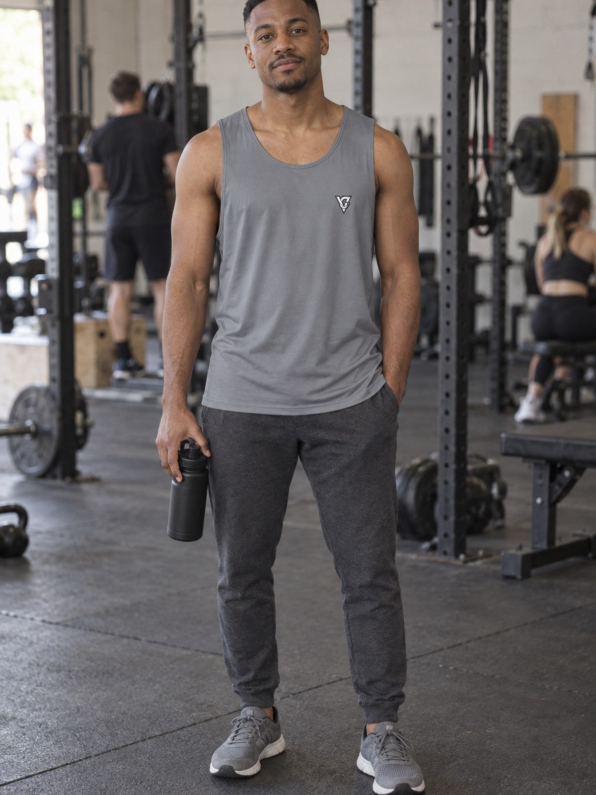 Man wearing the Stone Grey Essential Men's Athletic Tank