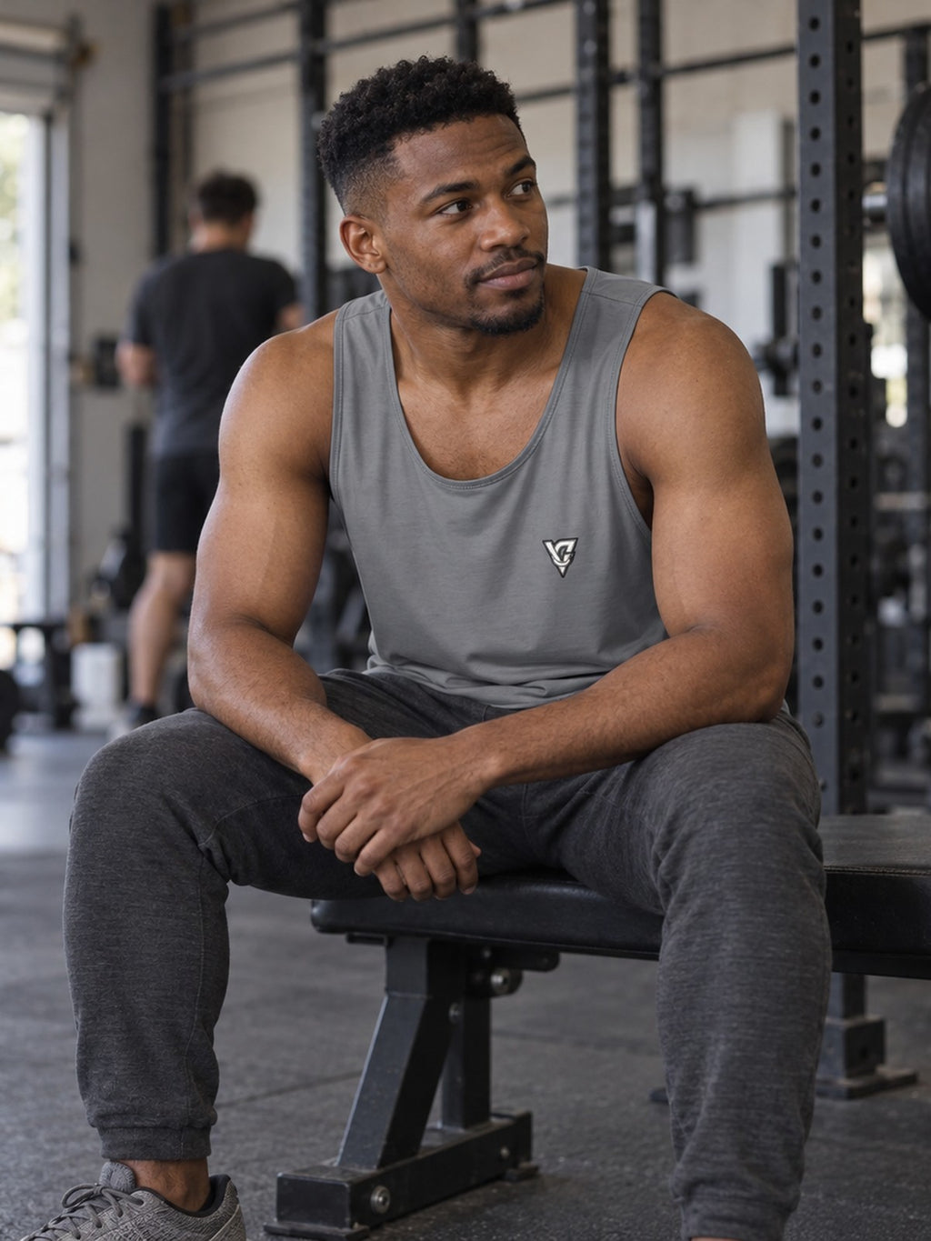 Man wearing the Stone Grey Essential Men's Athletic Tank