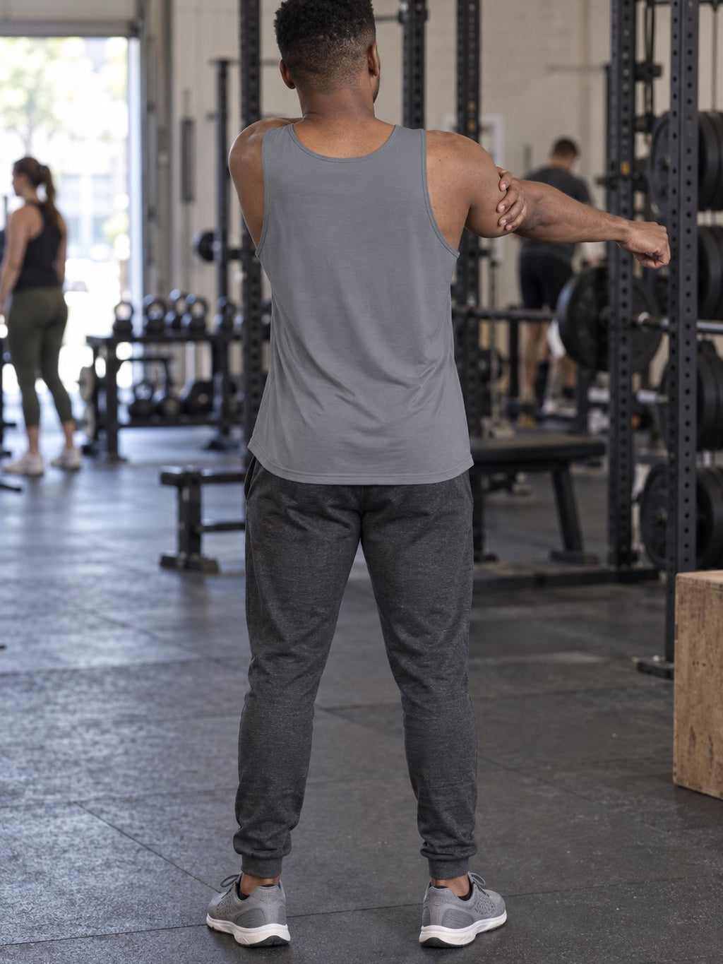Man wearing the Stone Grey Essential Men's Athletic Tank