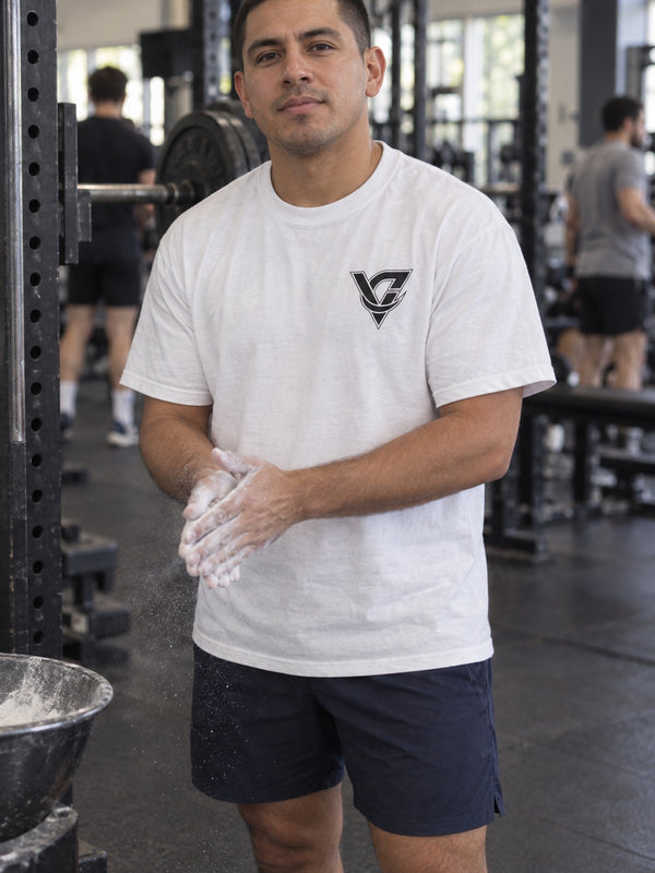 Graphic Tee — Minimal Geometric V Logo Chest Print