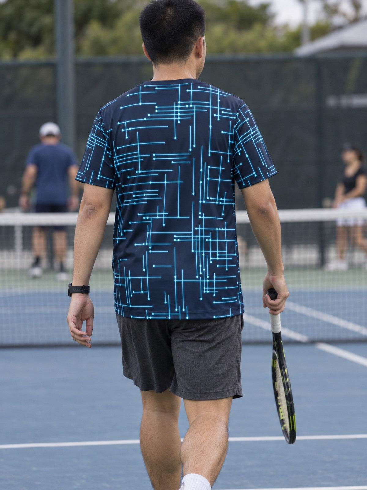Man training in the Circuit Surge men's sports jersey with the Vantacore V emblem on the left chest – back view