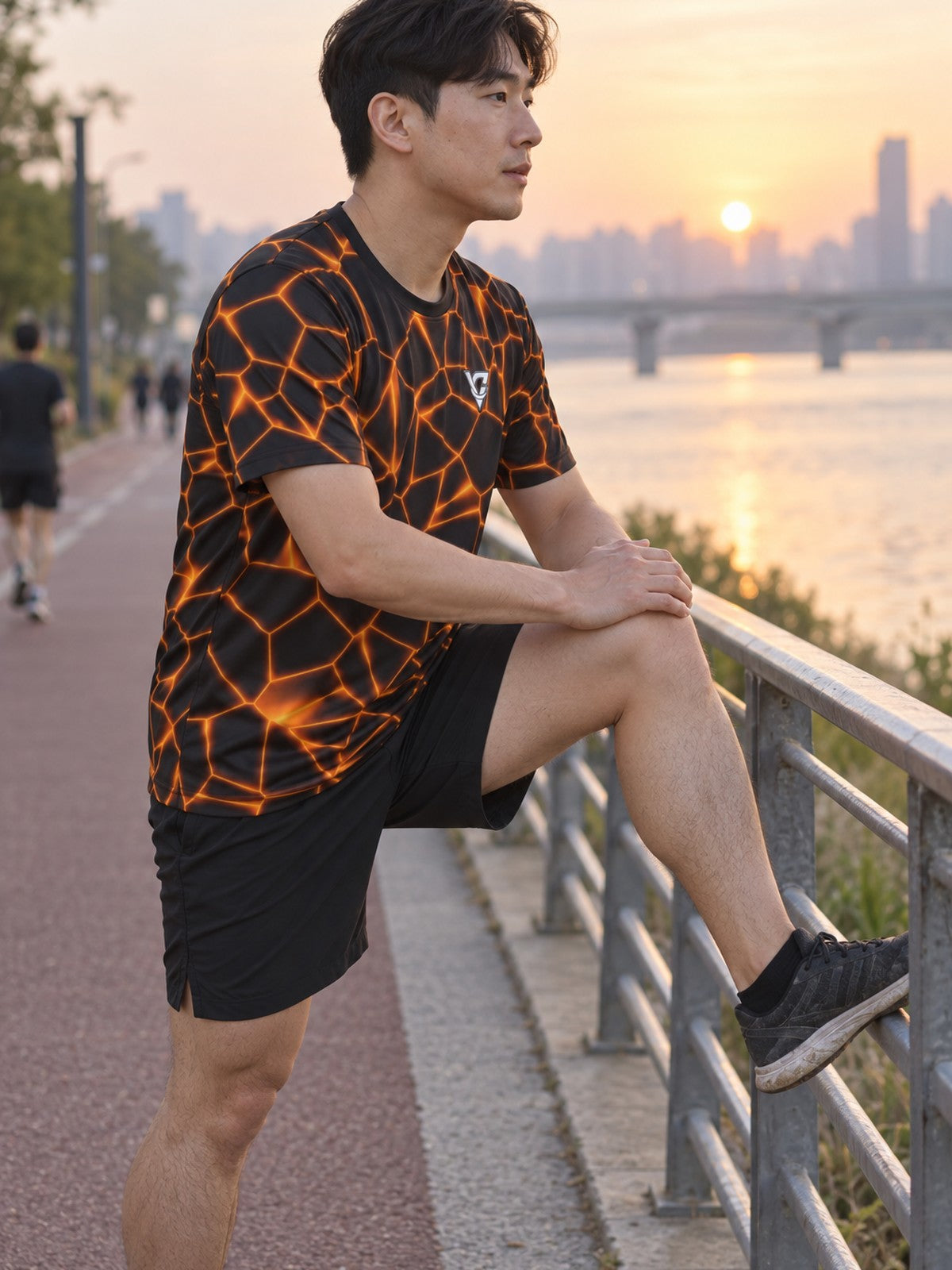 Man training in the Magma Rift men's sports jersey with the Vantacore V emblem on the left chest – side view