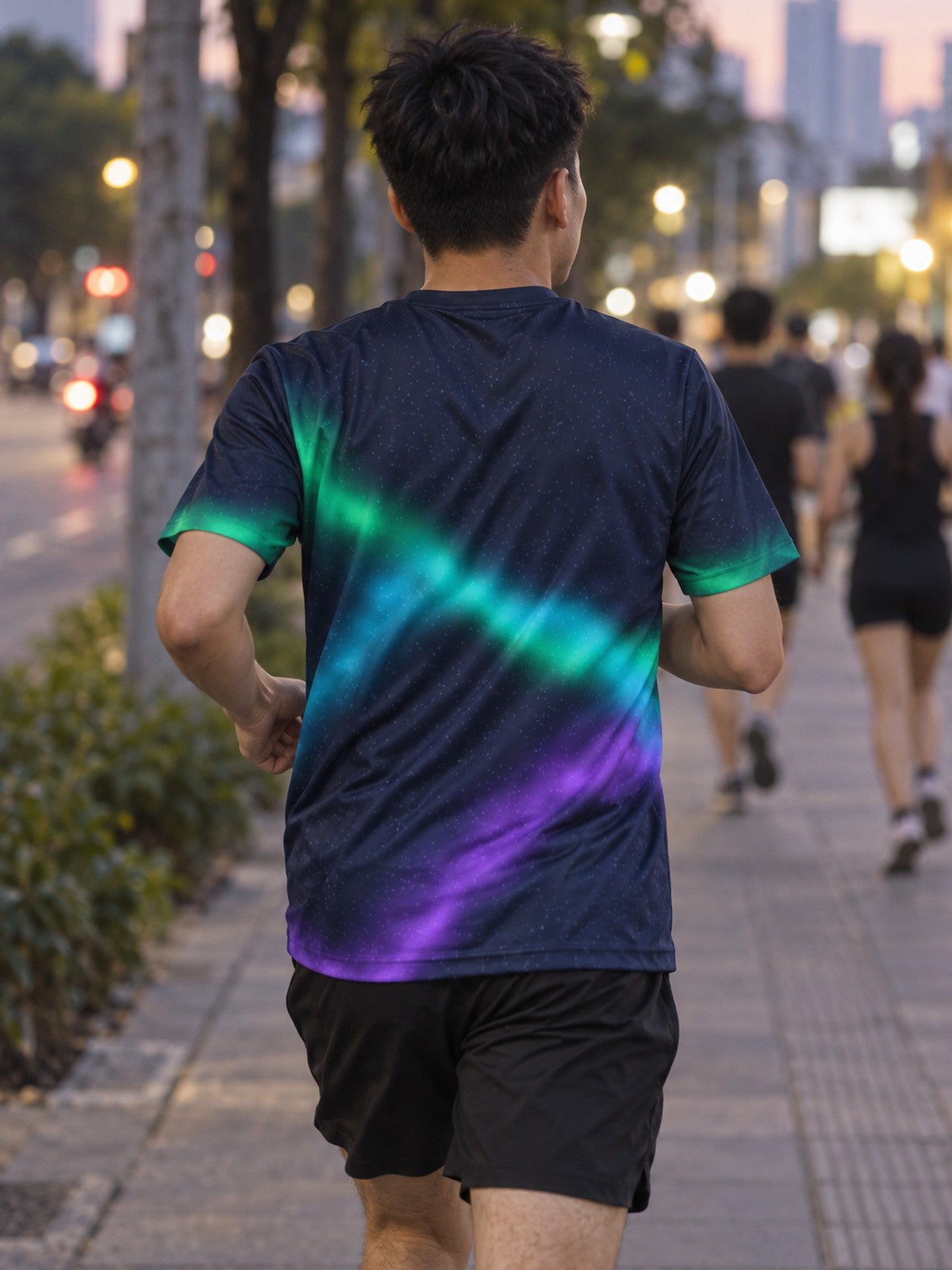 Man training in the Northern Lights men's sports jersey with the Vantacore V emblem on the left chest – back view