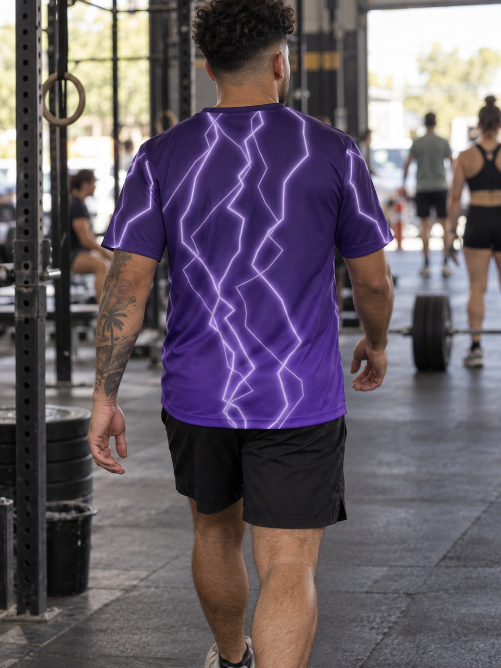 Man training in the Storm Bolt men's sports jersey with the Vantacore V emblem on the left chest – back view