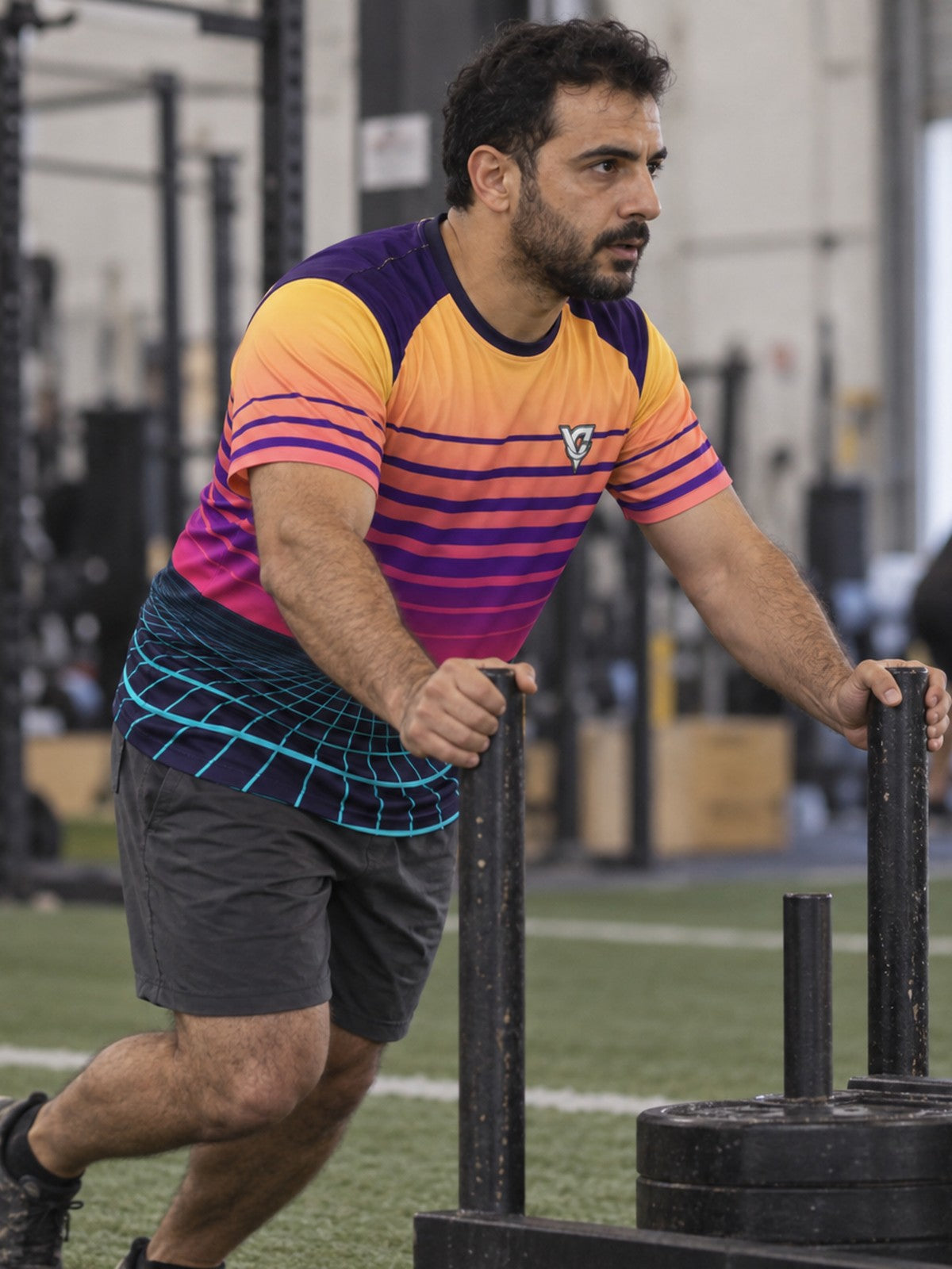 Man training in the Synthwave Grid men's sports jersey with the Vantacore V emblem on the left chest – side view